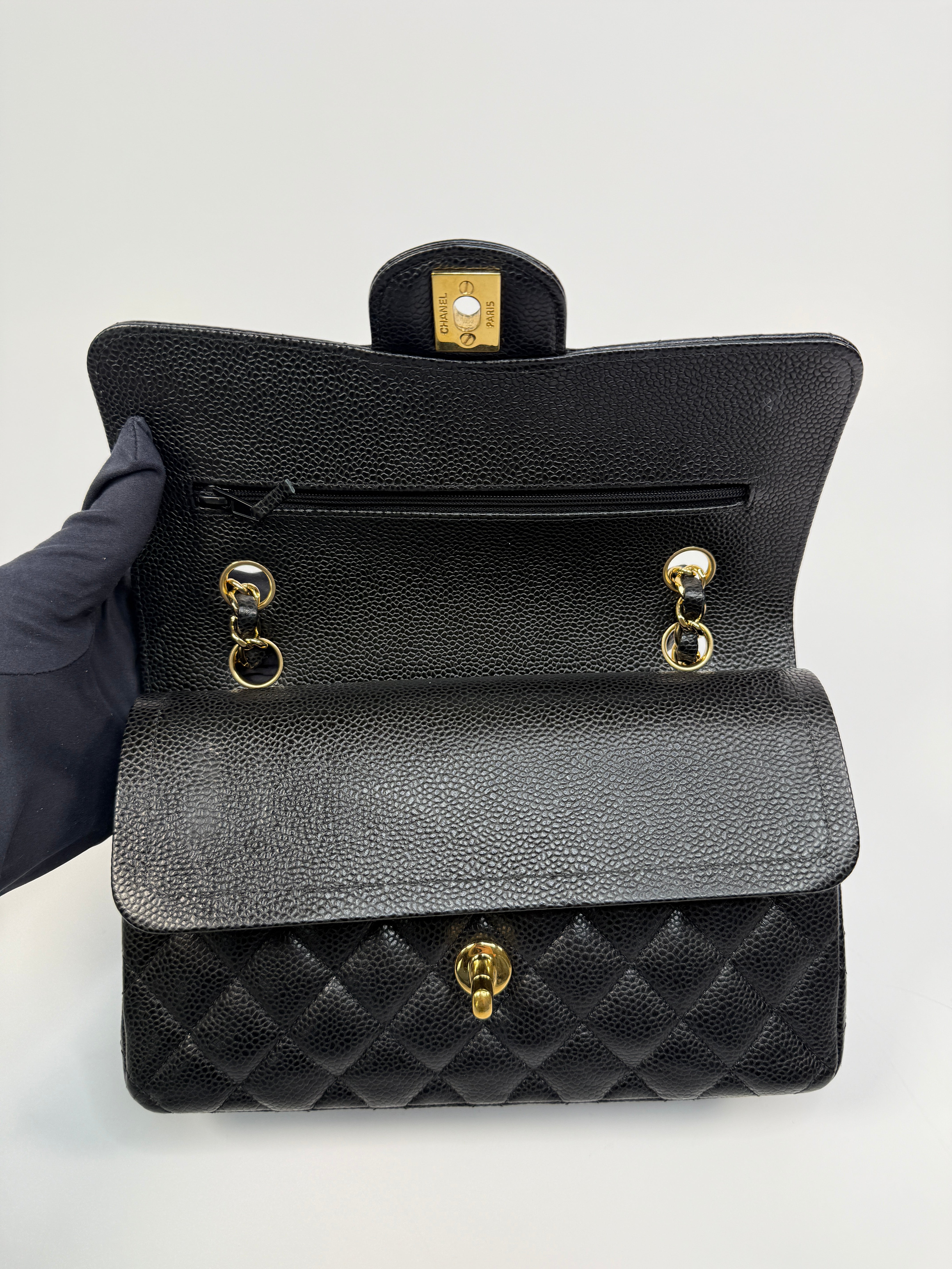 Chanel Small Classic Double Flap In Black Caviar Leather With Gold Hardware
Pre Loved & Authentic 