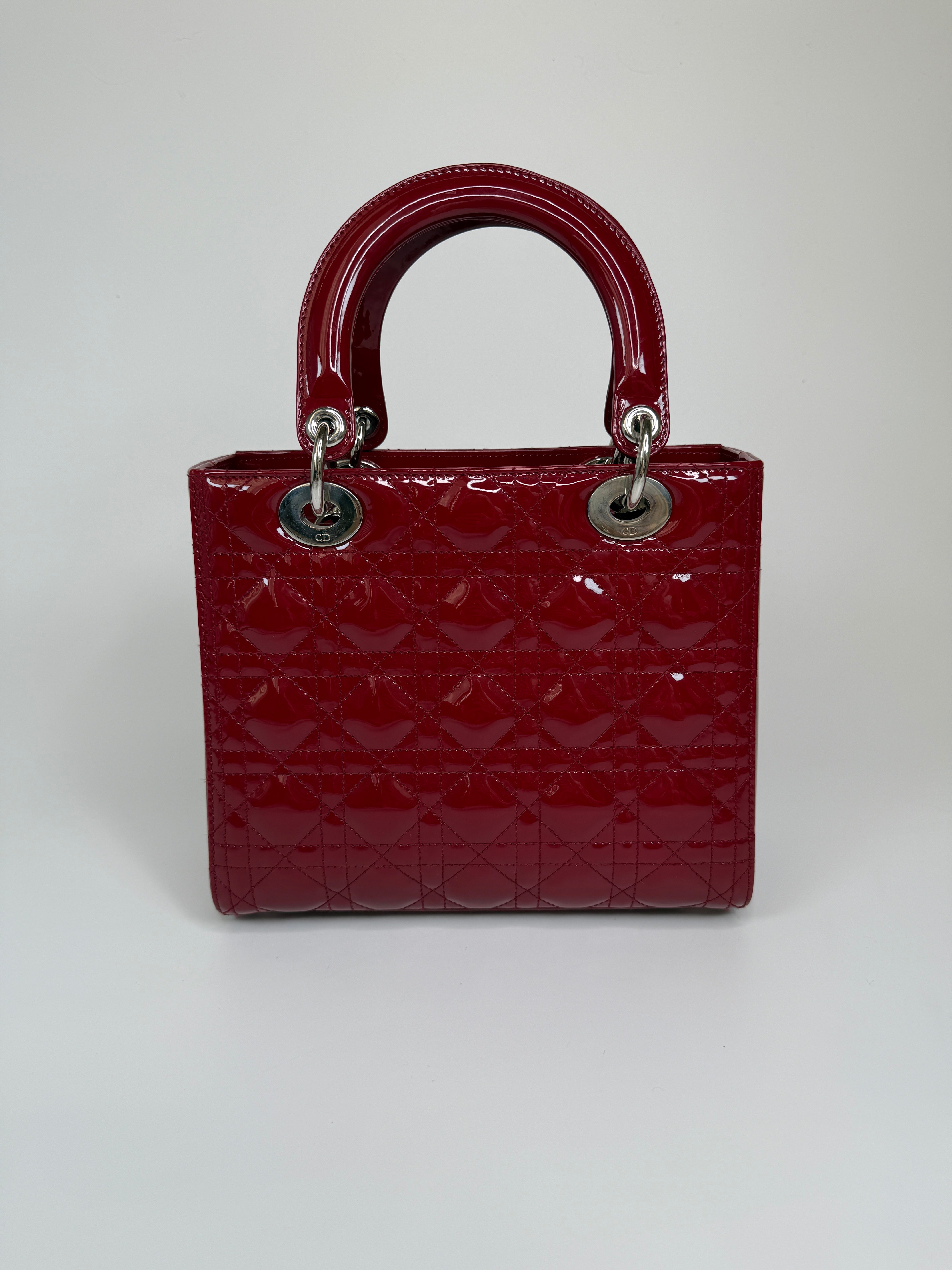 Christian Dior Medium Lady Dior In Patent Red Leather With Silver Hardware Authentic and preloved. 100% Authenticity Guarantee 