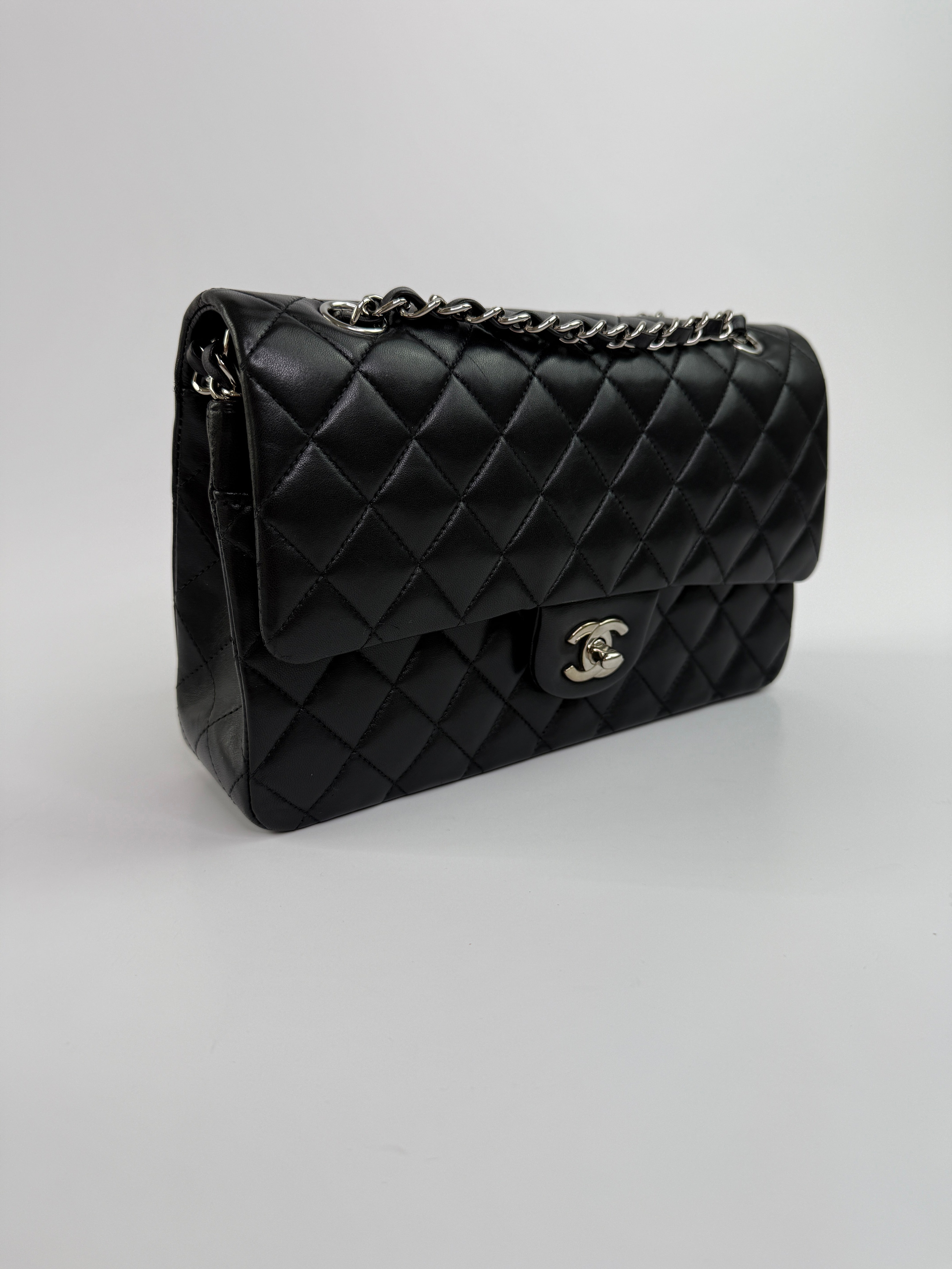 Chanel Medium Classic Double Flap Black Lambskin Leather With Silver Hardware
Pre Loved & Authentic 