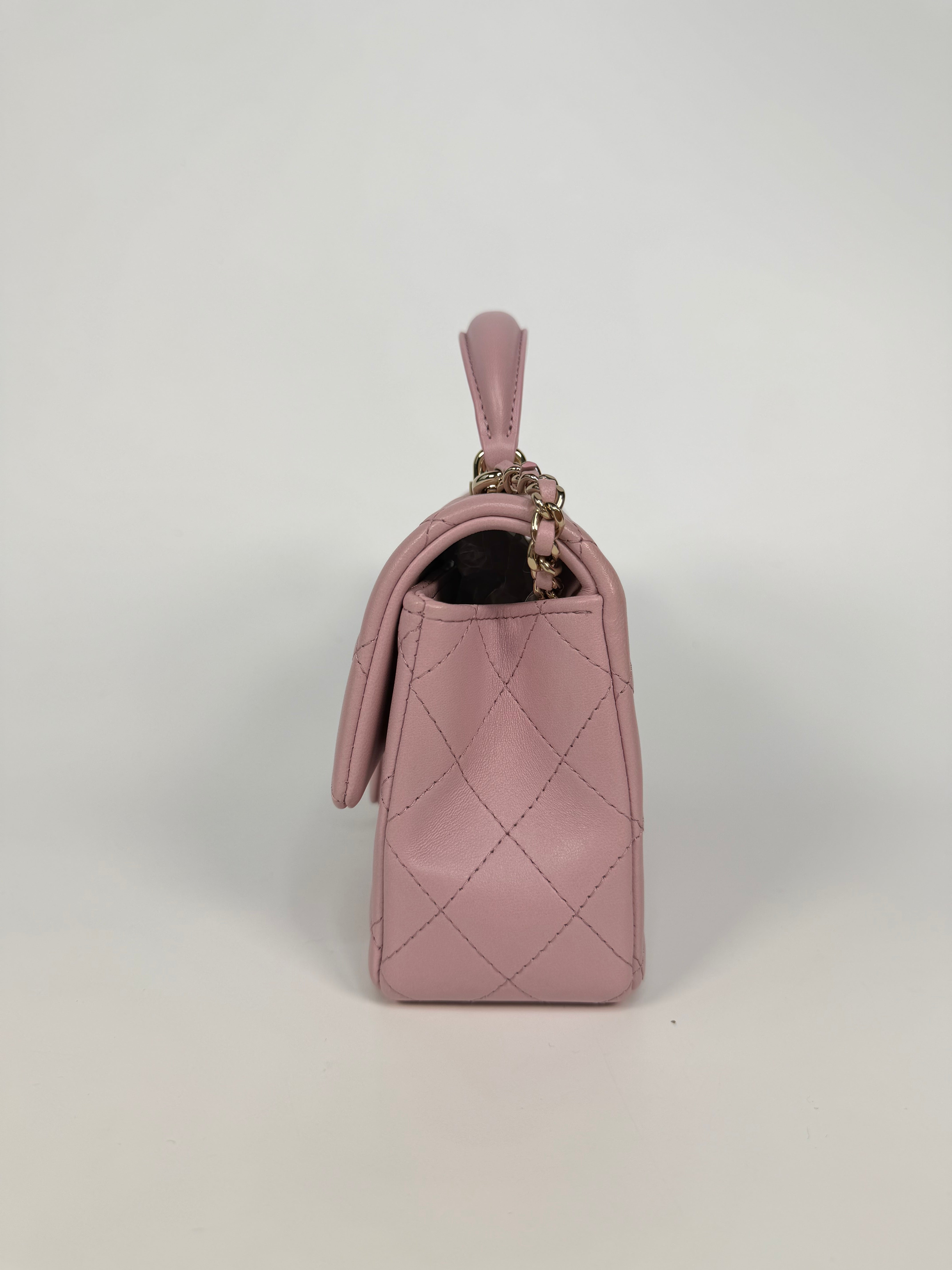Chanel Mini Rectangle Top Handle In Pink Lambskin Leather With Pale Gold Hardware. 100% authentic and preloved in excellent condition
