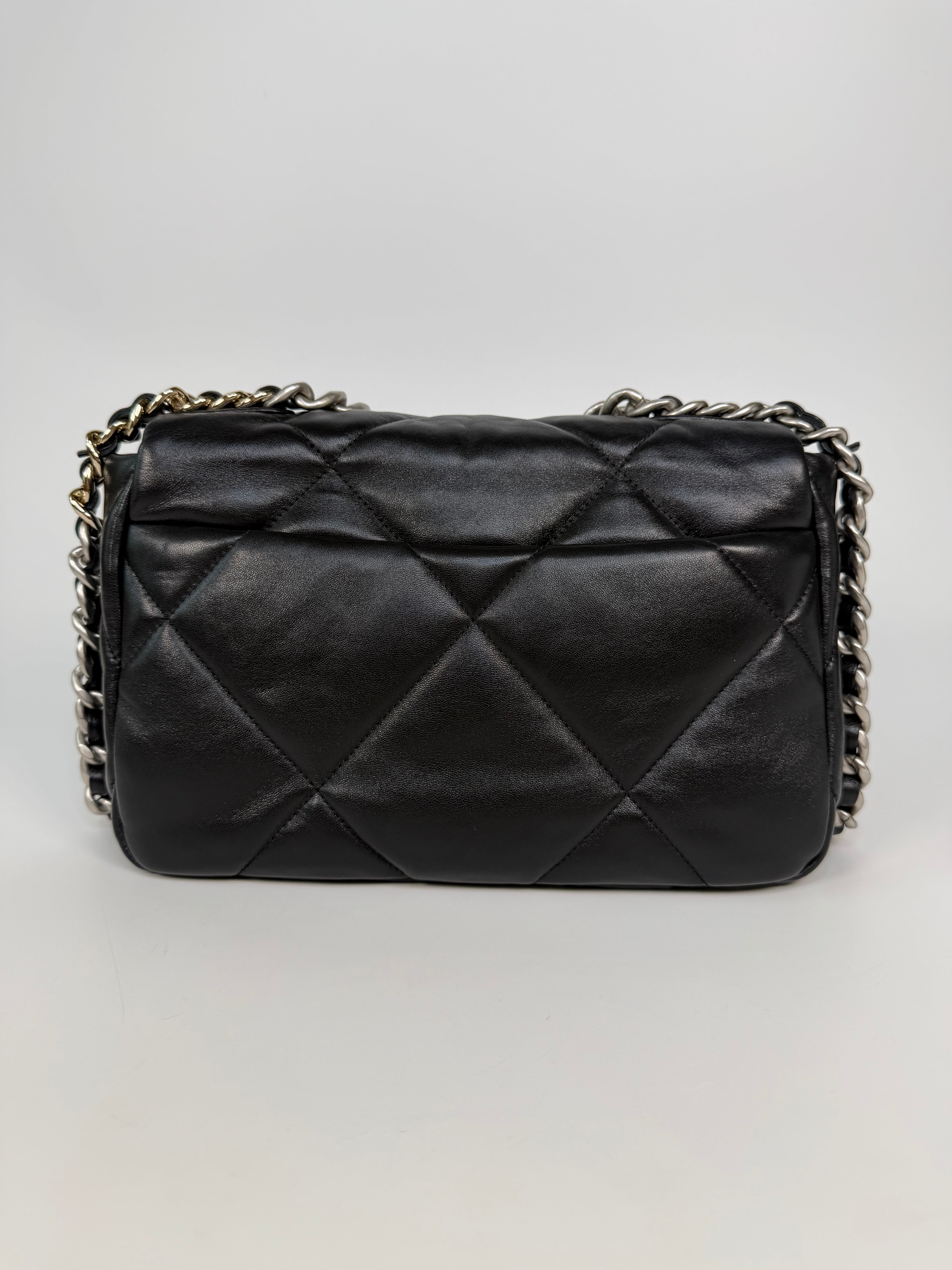 Chanel 19 Small In Black & White Leather With Mixed Hardware. Authentic and preloved in excellent condition. Verified by Luxe Cheshire.