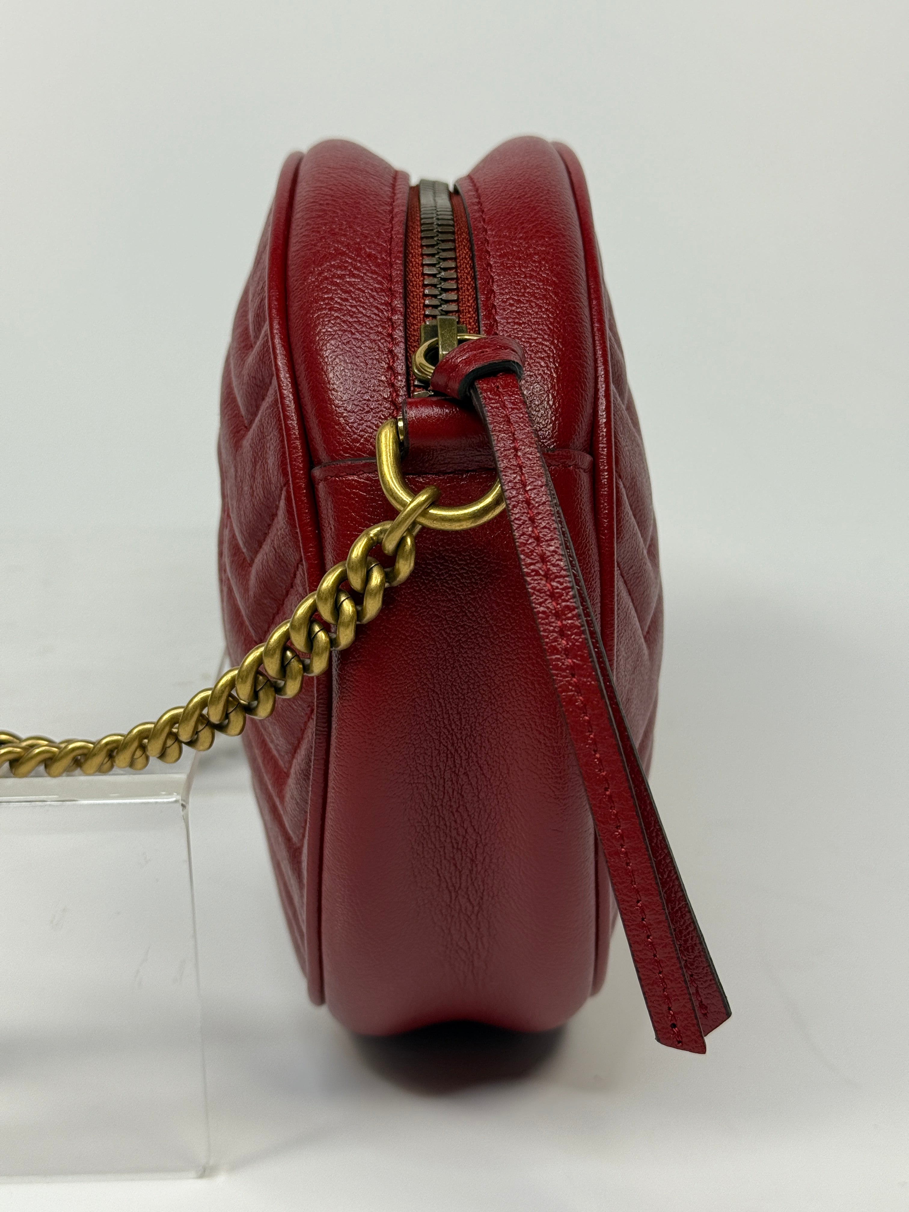 Gucci GG Marmont Round Shoulder Bag In Red Leather, very good condition. Authentic and preloved. 100% Authenticity guarantee