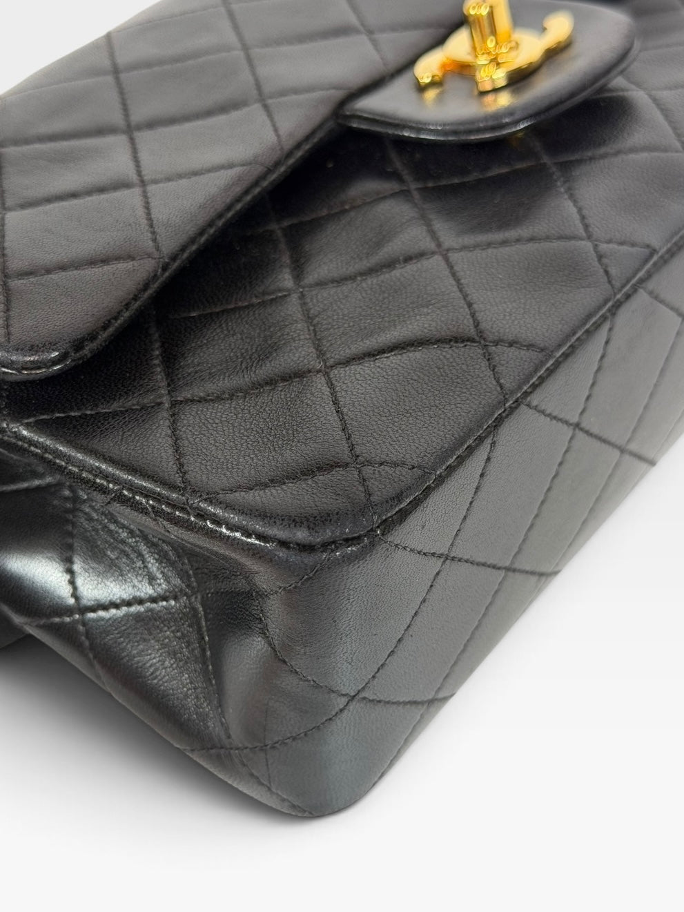 Chanel Vintage Small Classic Double Flap In Black Lambskin Leather 24Kt Hardware. Authentic and preloved in excellent condition. 100% guarantee