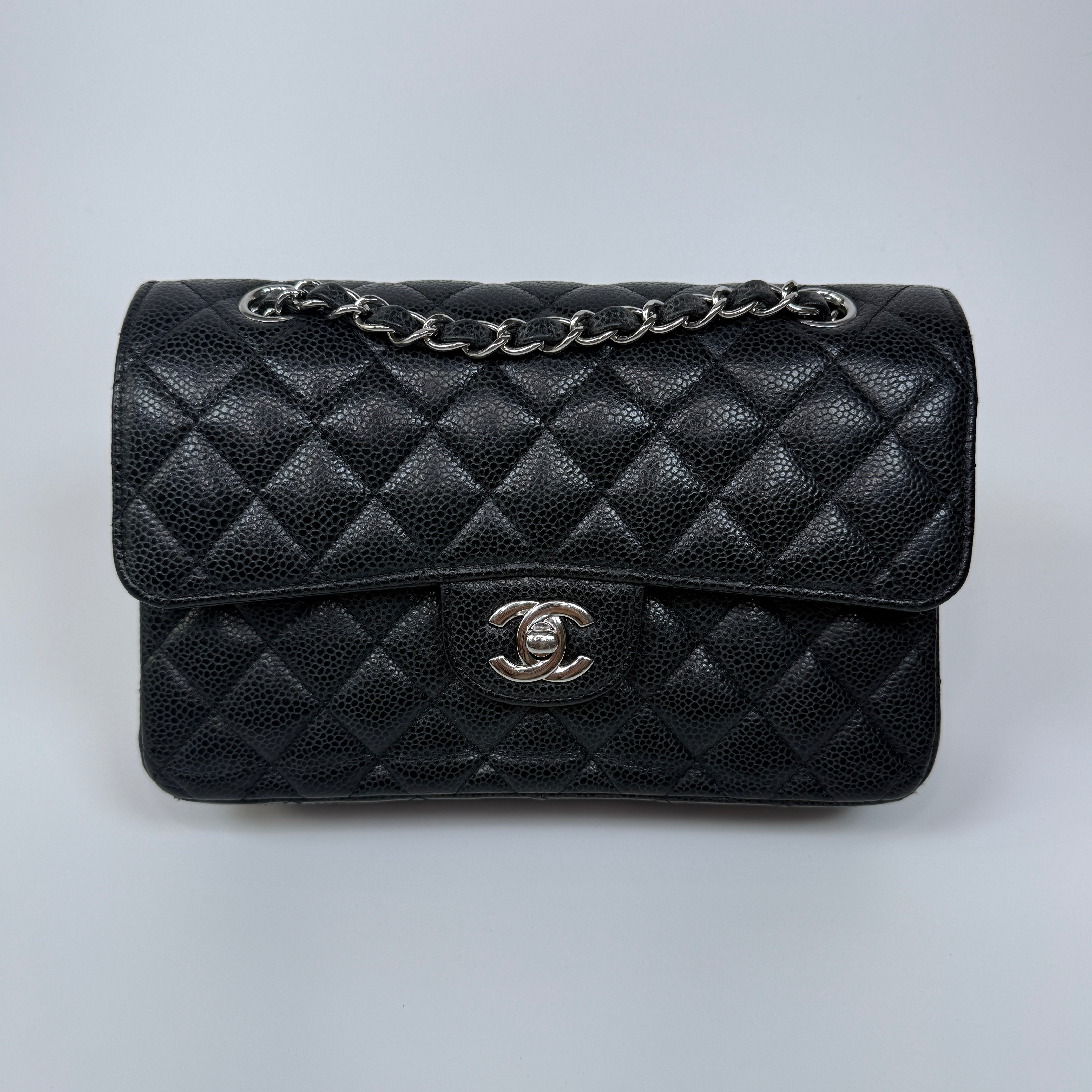 Chanel Small Classic Double Flap In Black Caviar Leather With Silver Hardware. Authentic and preloved in very good condition. 100% Authenticity guarantee 