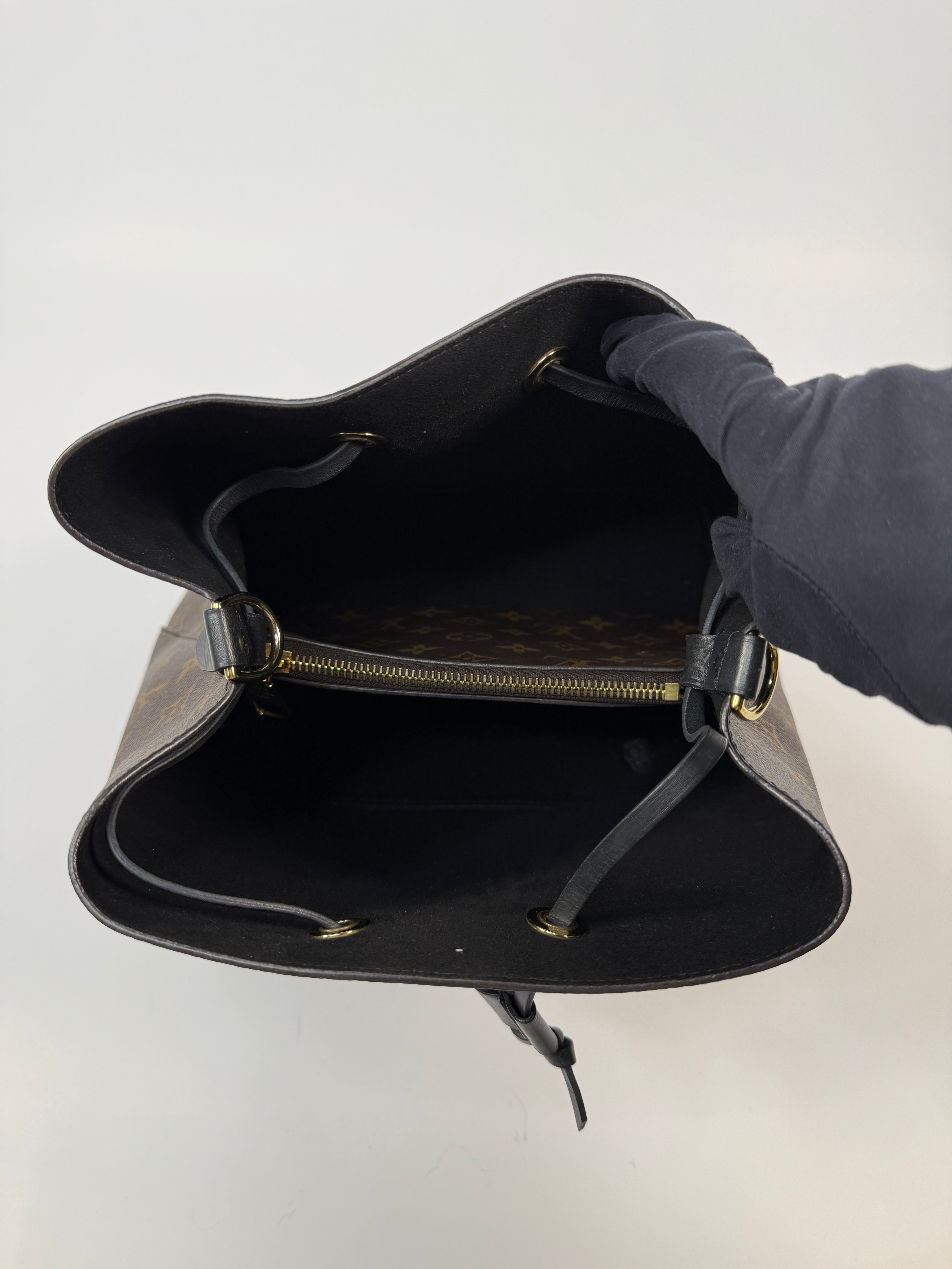 Authetic and preloved Louis Vuitton NéoNóe MM Bucket Bag In Brown Coated Canvas 