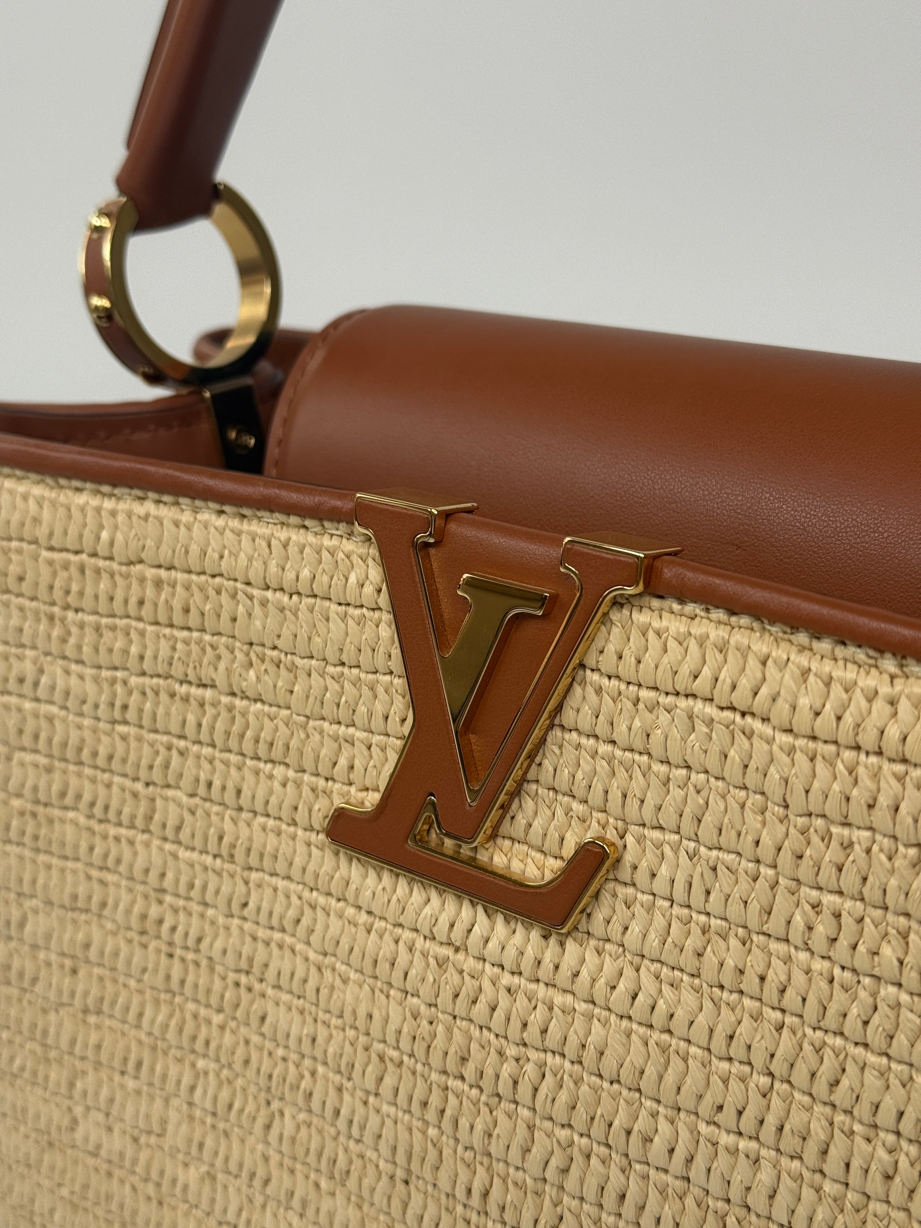 Louis Vuitton Capucines MM Bag In Raffia. Excellent Preloved condition. 100% Authenticity guarantee. 