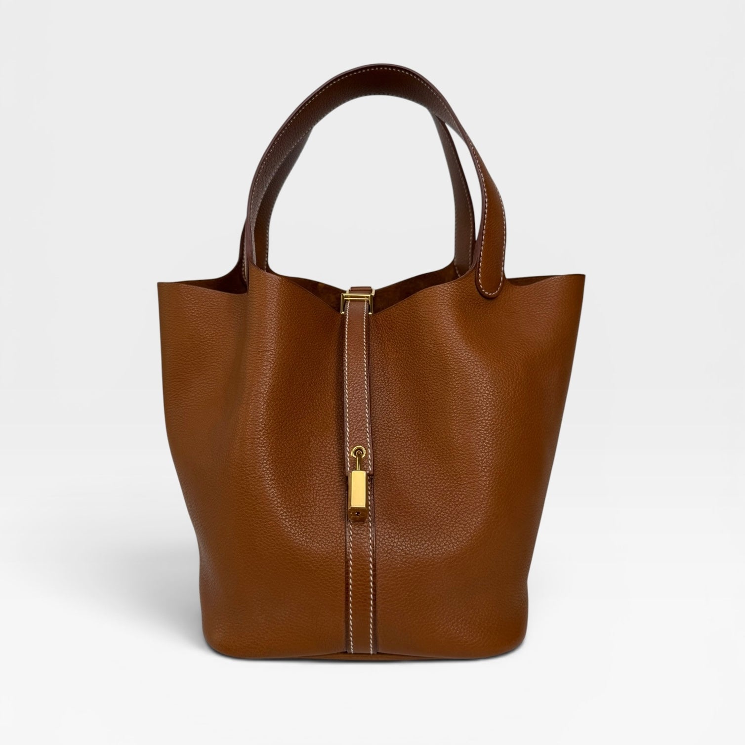 Hermès Picotin 22 In Gold Barenia Fauboug Leather With Gold Hardware. Authentic and preloved in excellent condition