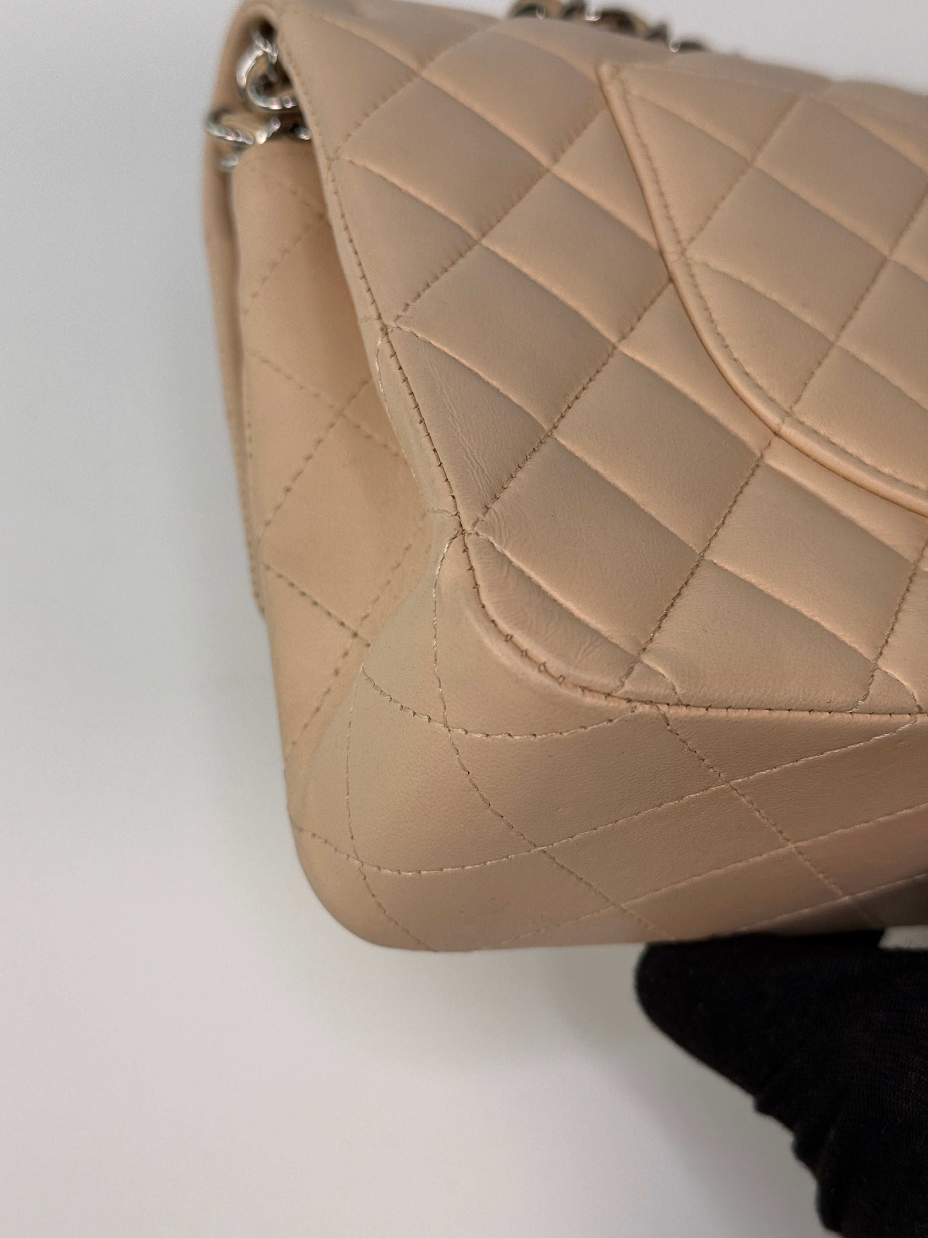Authentic and preloved Chanel Medium Classic Double Flap Light Beige Lambskin Leather With Silver Hardware