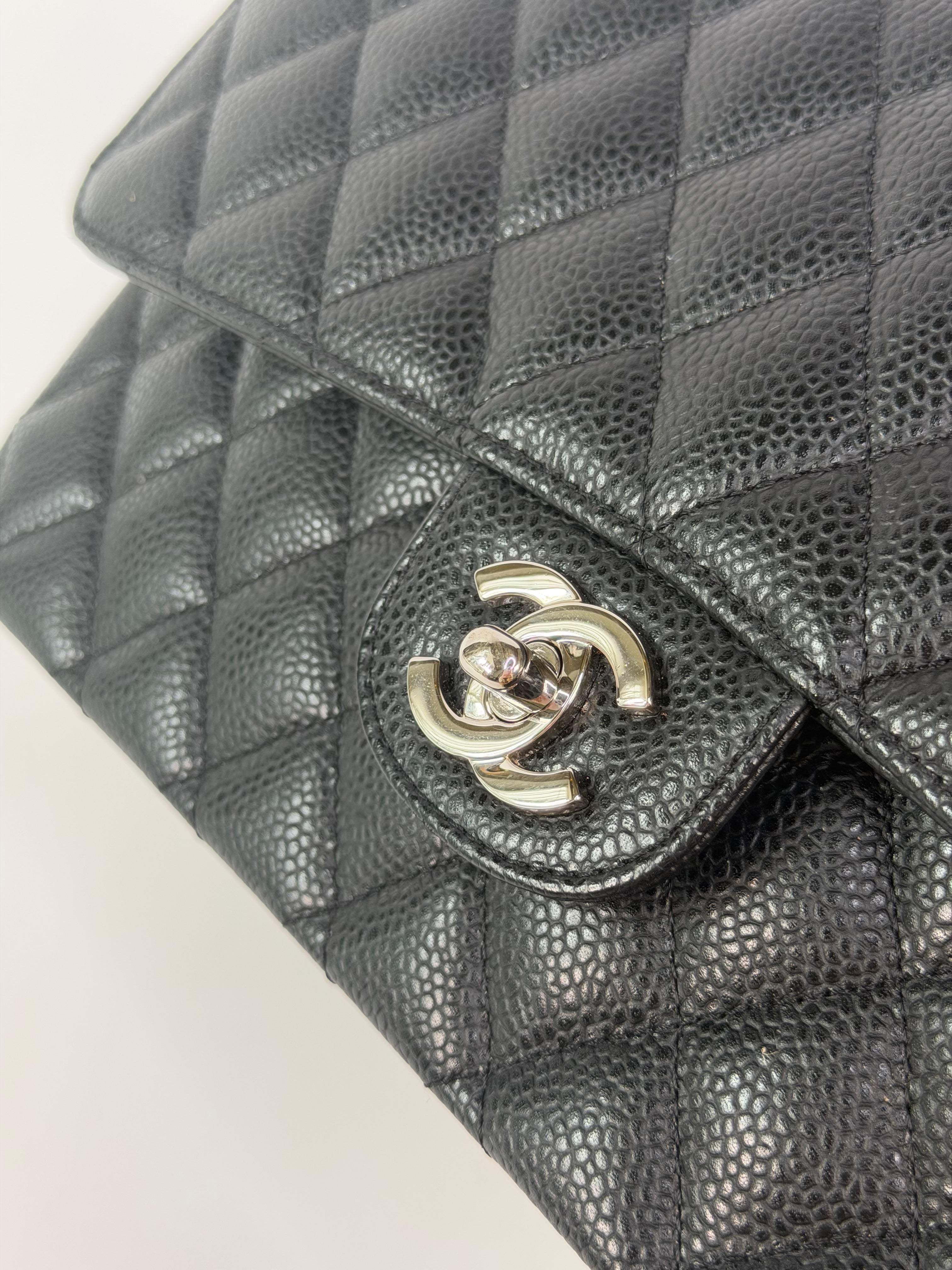 Chanel Vintage Medium Classic Double Flap Black Caviar Silver Hardware. 100% authentic and preloved in excellent condition