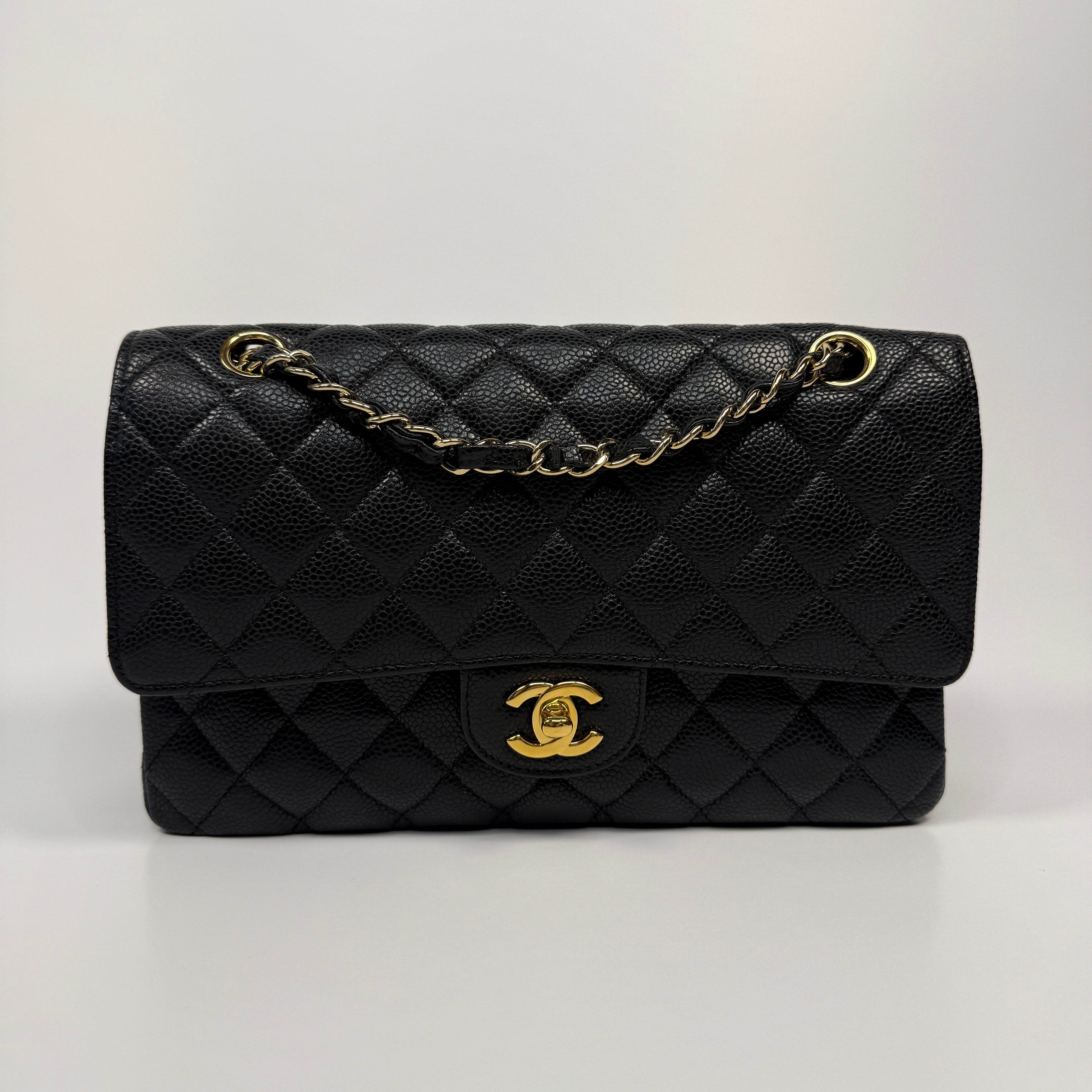Chanel Medium Classic Double Flap Black CaviarWith Gold Hardware
Pre Loved & Authentic 