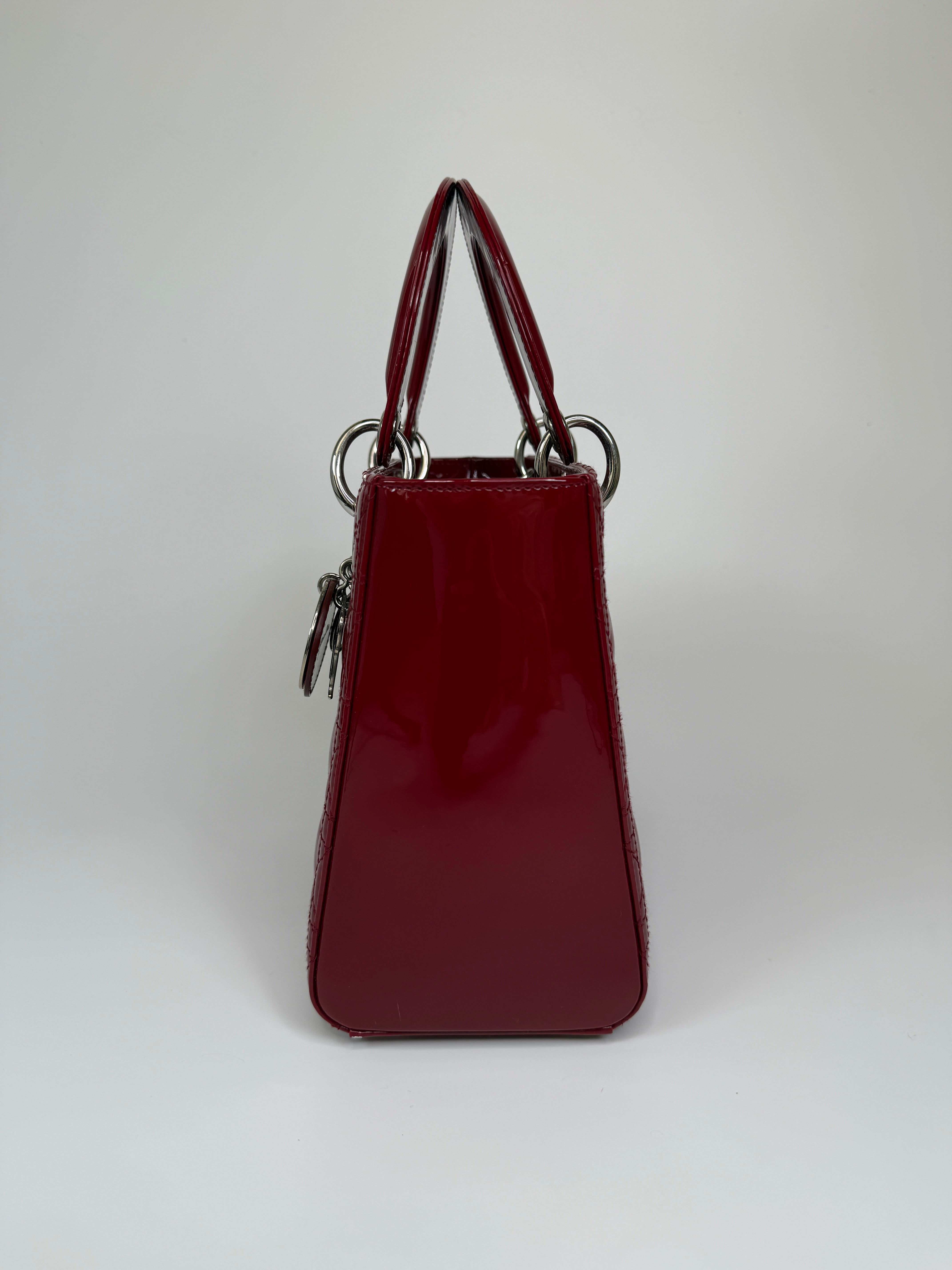 Christian Dior Medium Lady Dior In Patent Red Leather With Silver Hardware Authentic and preloved. 100% Authenticity Guarantee 