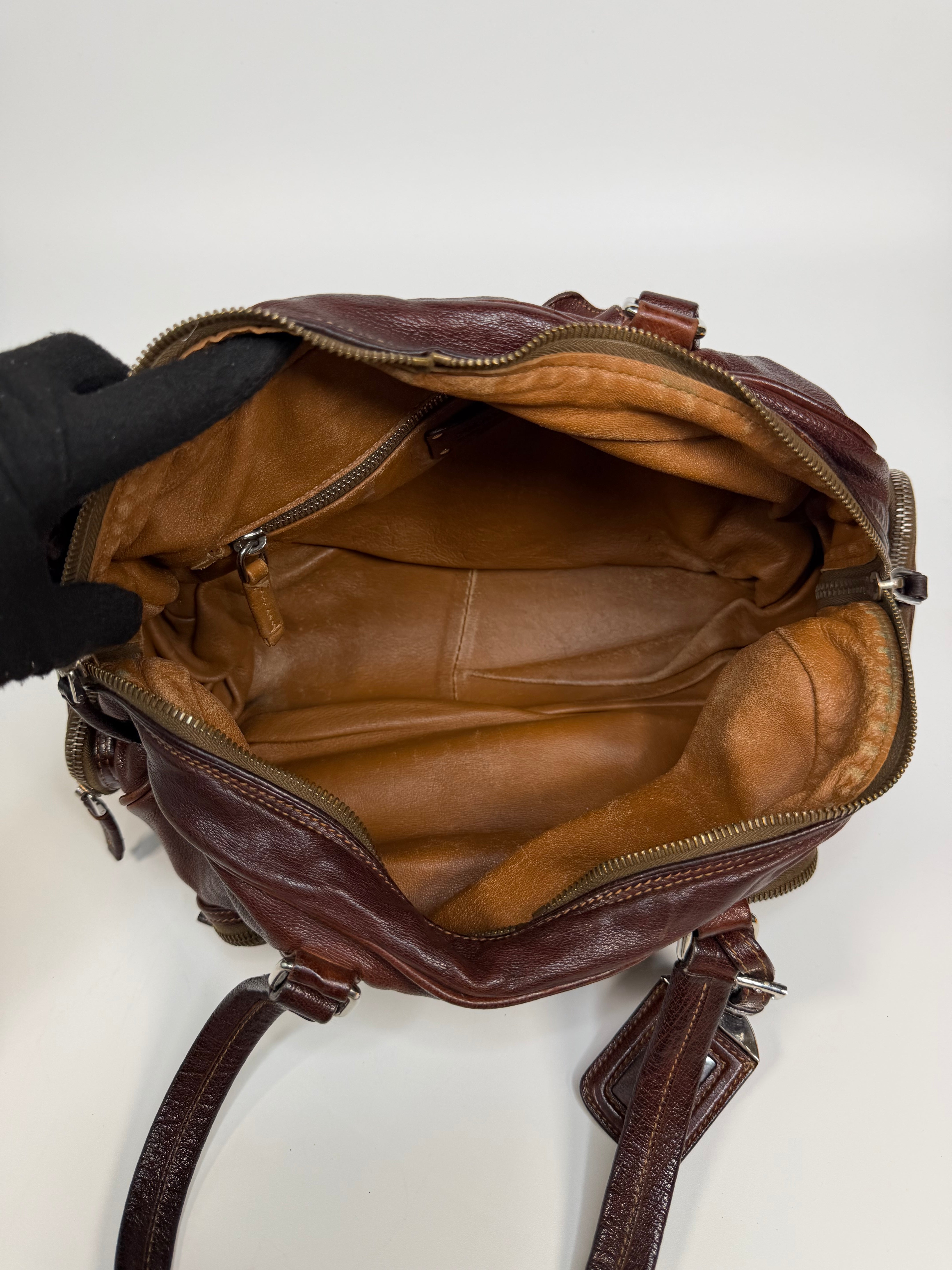 Prada Washed Bauletto Shoulder Bag In Brown Leather With Gold Hardware. Authentic and preloved in very good condition