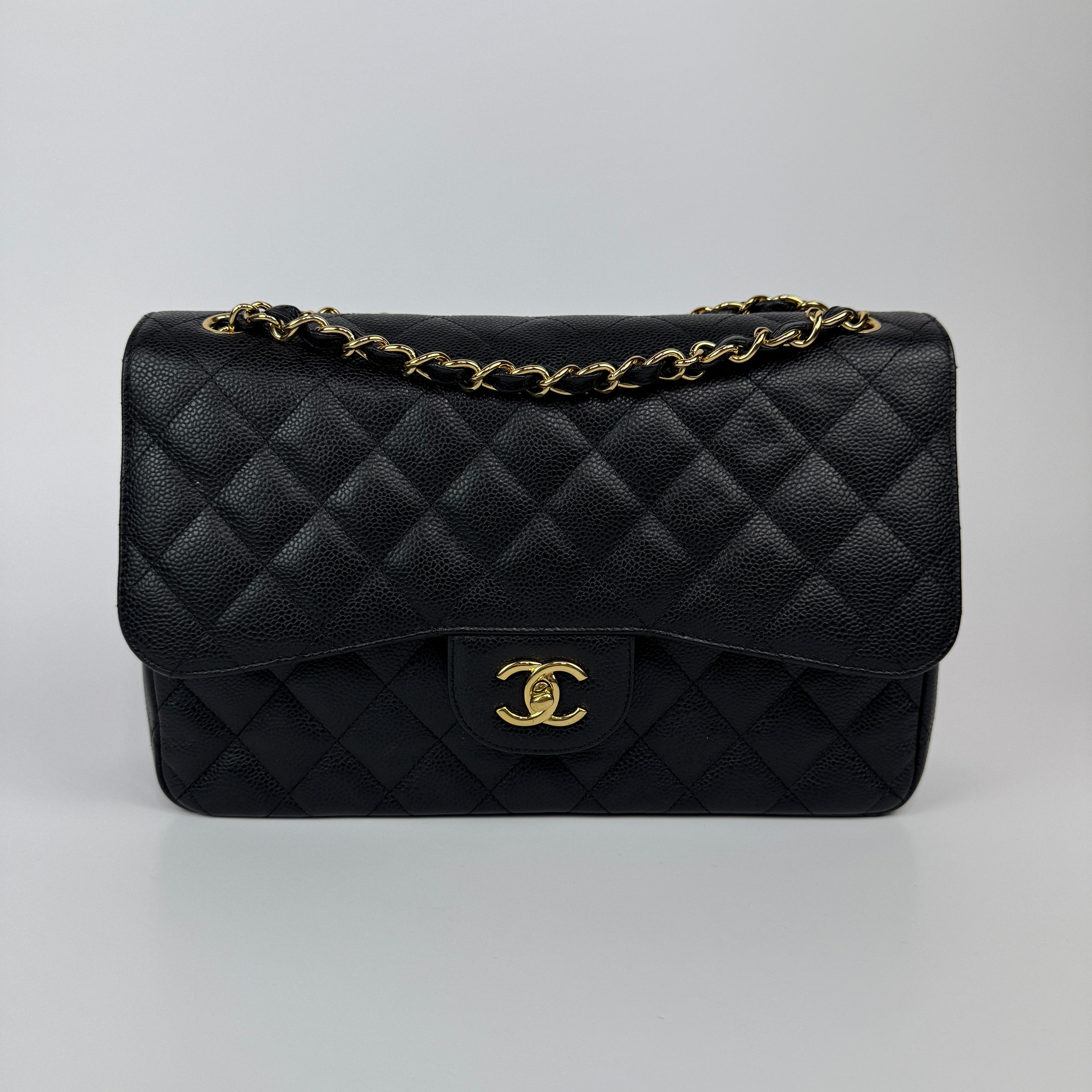Chanel Jumbo Classic Double Flap In Black Caviar Gold Hardware
Pre Loved & Authentic 