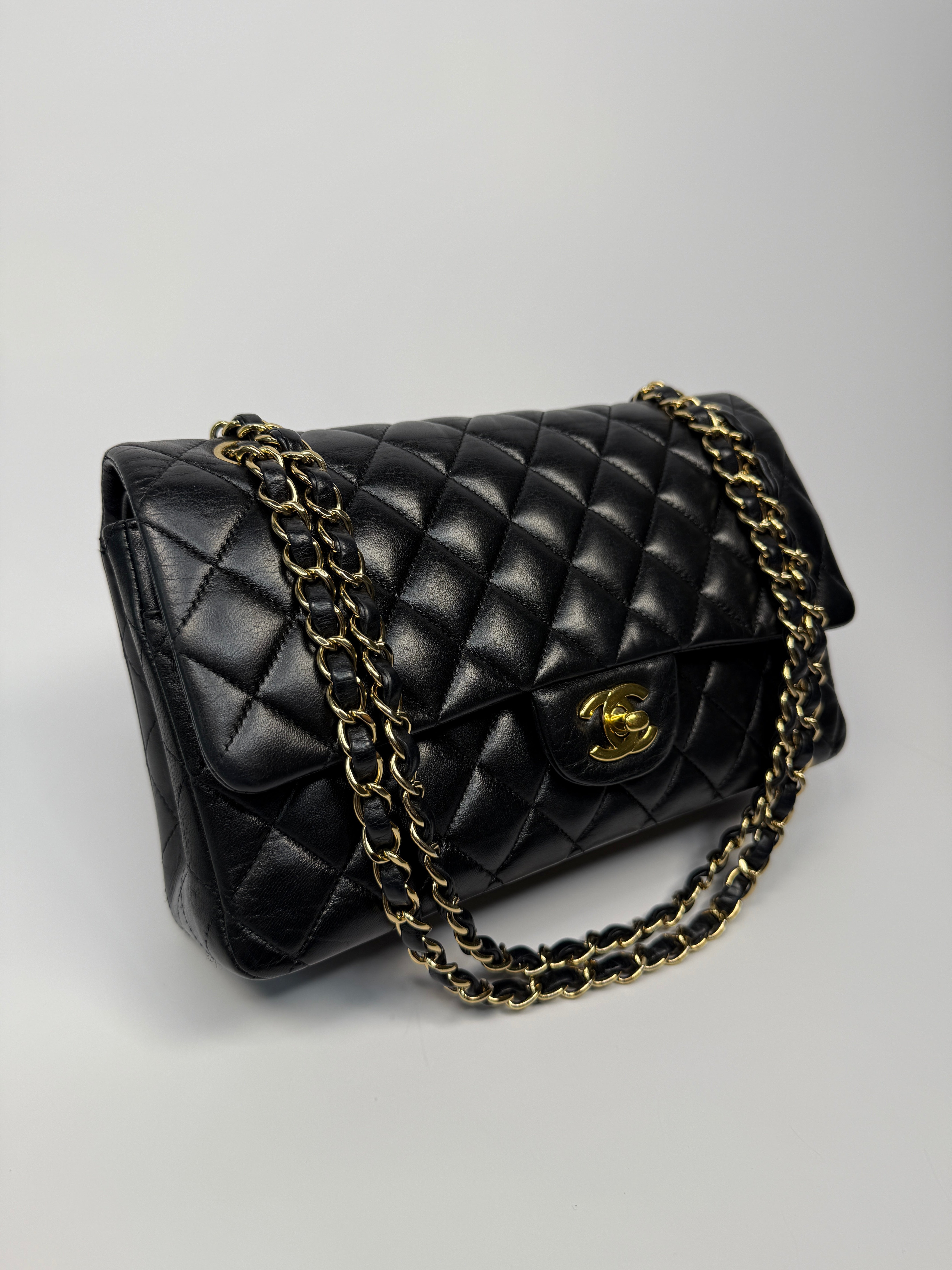 Chanel Medium Classic Double Flap Black Lambskin With Gold Hardware
Pre Loved & Authentic 