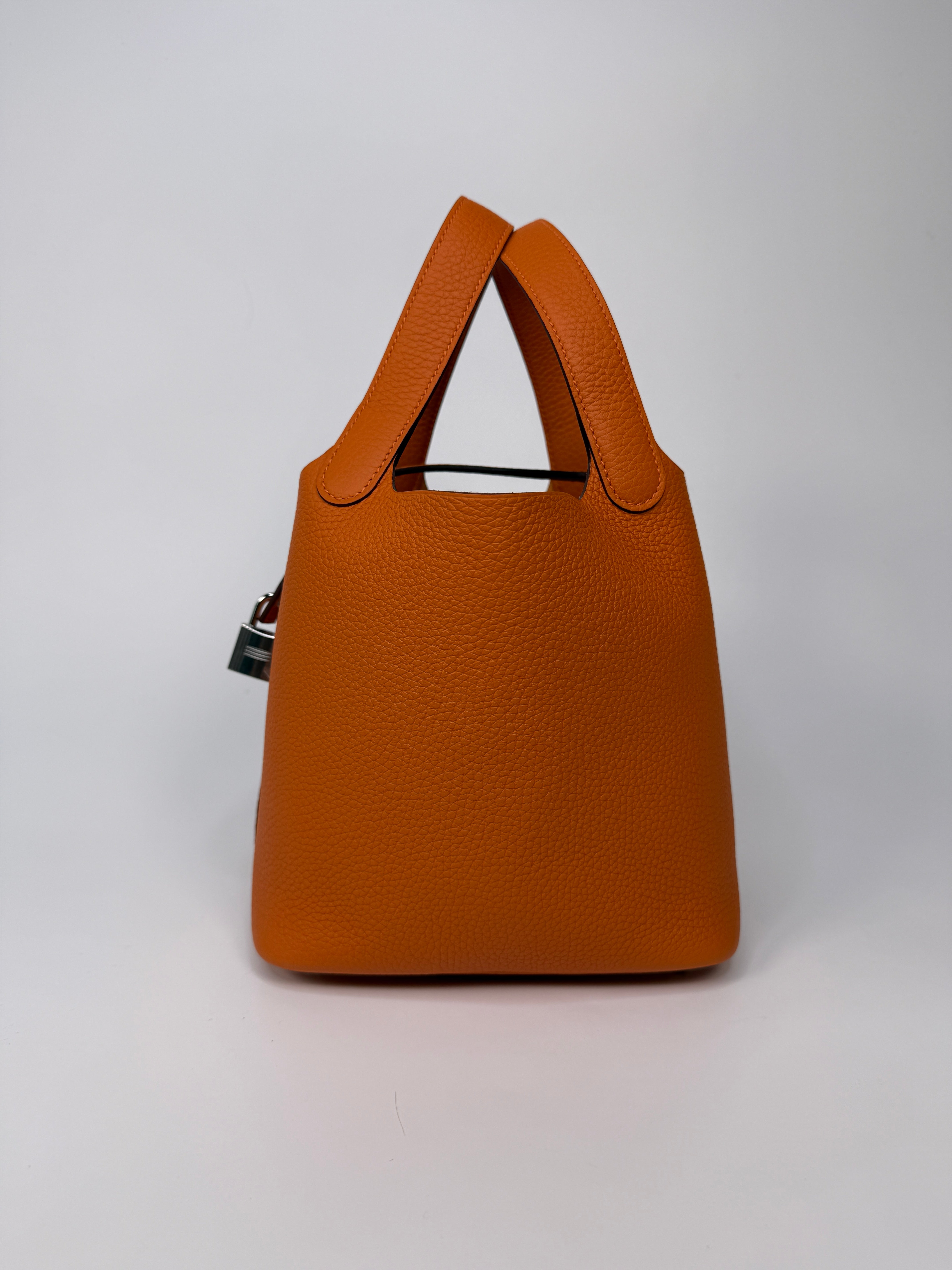 Hermès Picotin 18 In Orange Clemence Leather With Palladium Hardware
Authentic Pre Loved Verified by Luxe Cheshire Trusted Designer resale
