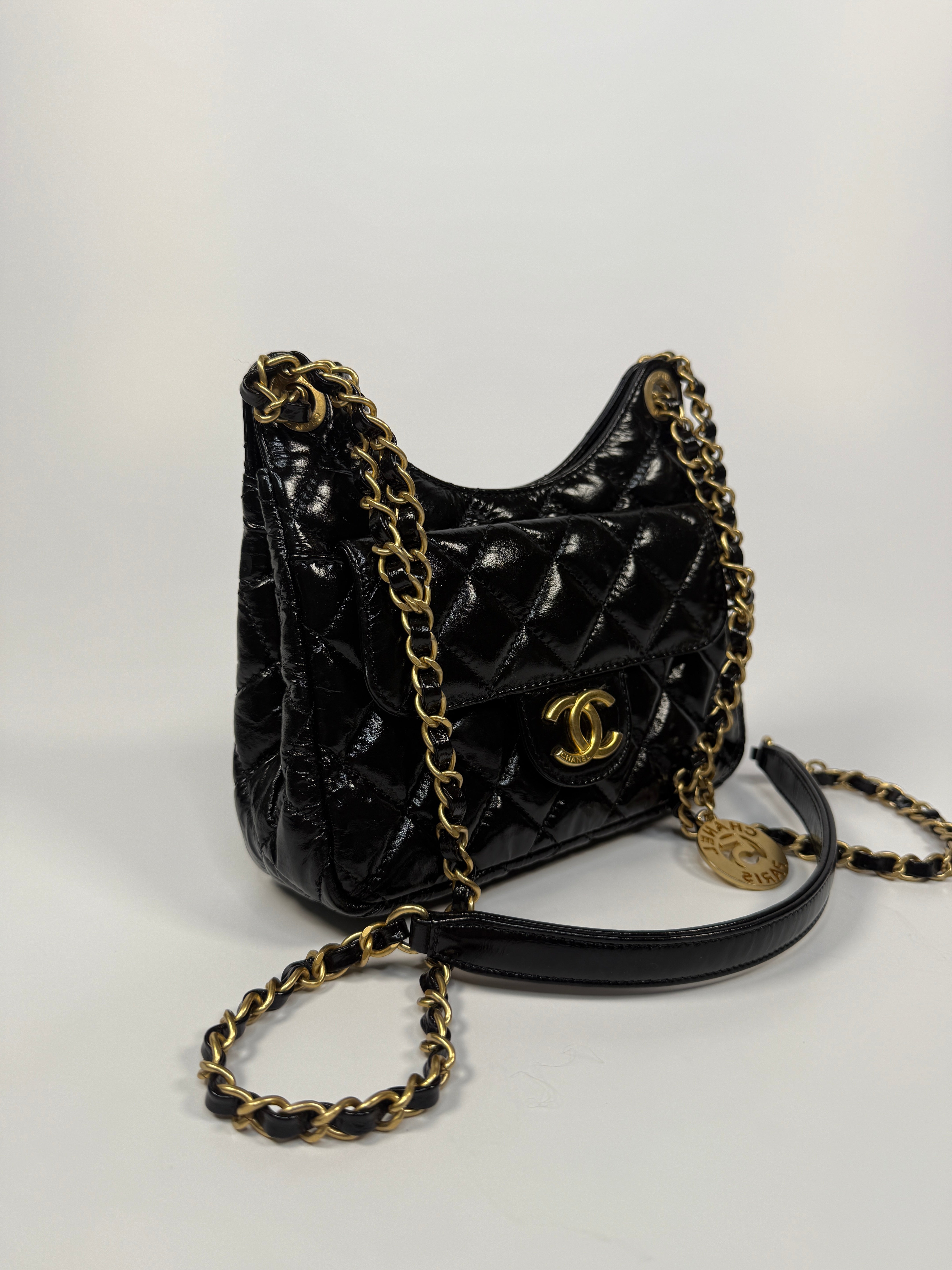 Chanel Mini Quilted Medallion Shoulder Bag In Black Calfskin With Gold Hardware. Authentic and preloved. Excellent condition. 