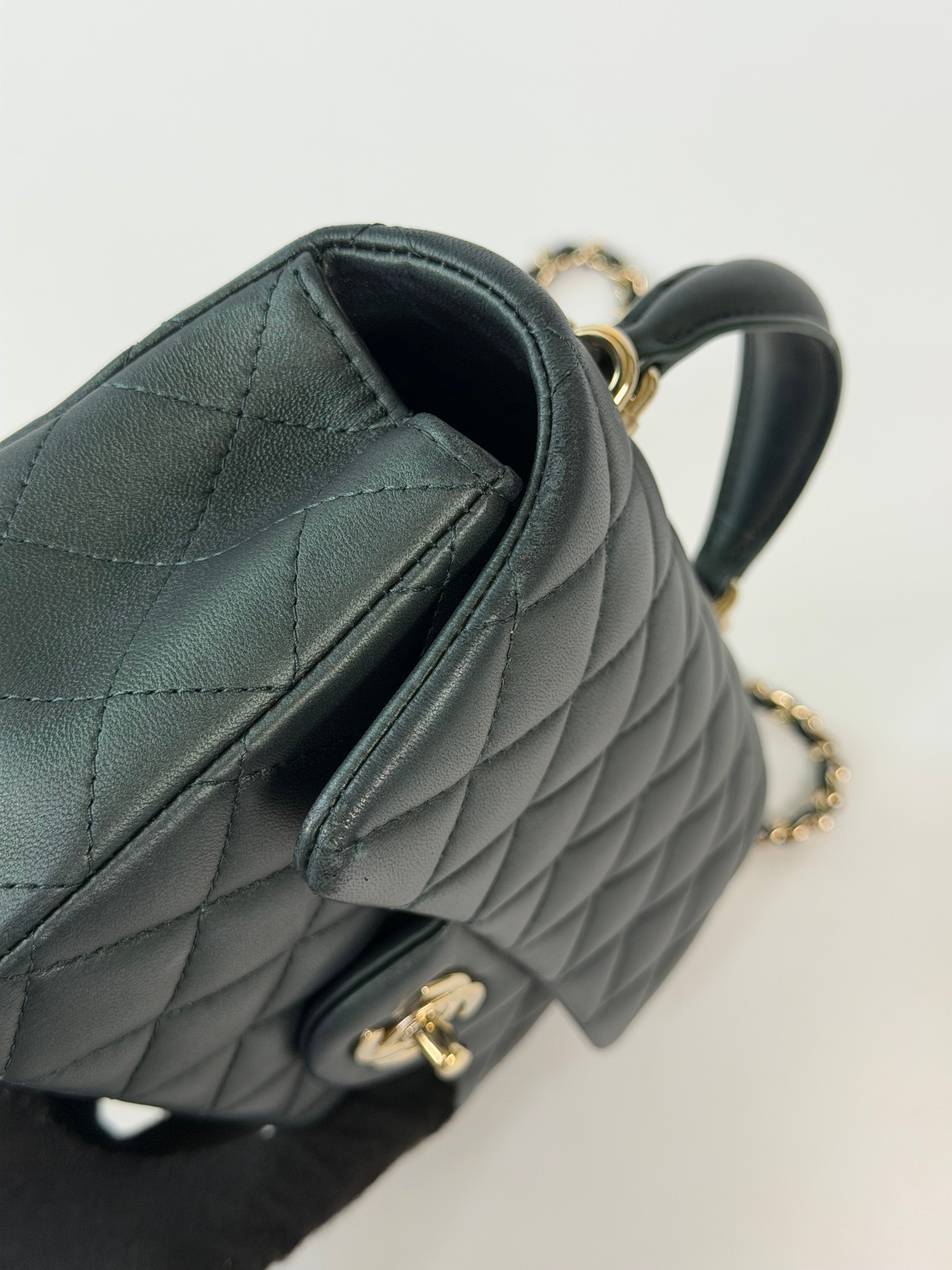 Chanel Mini Rectangle Top Handle In Metallic Green Lambskin Leather Gold Hardware. 100% authentic and preloved in excellent condition.