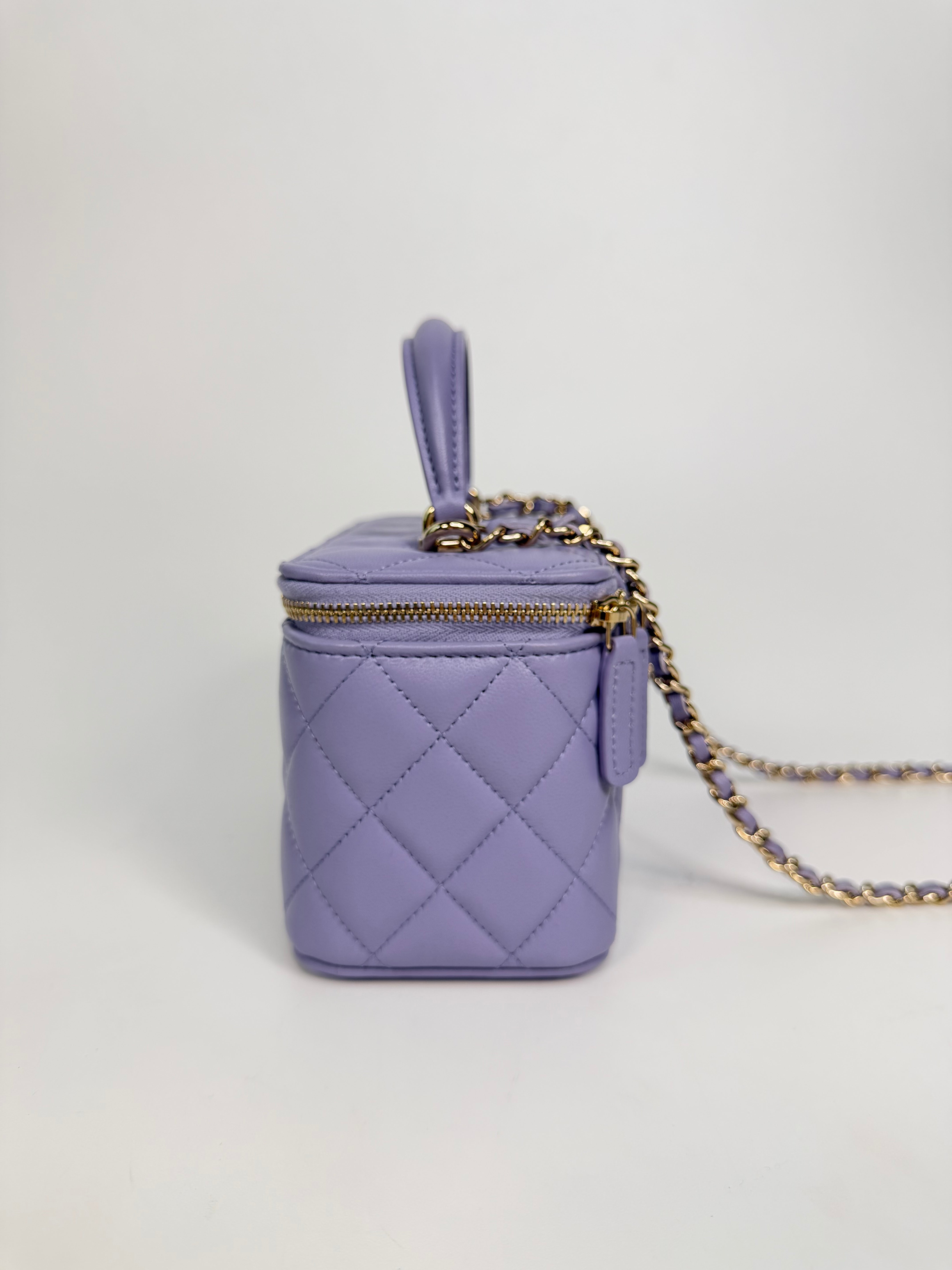 Chanel Mini Vanity Top Handle In Lilac Lambskin Leather With Gold Hardware. Authentic and preloved in excellent condition