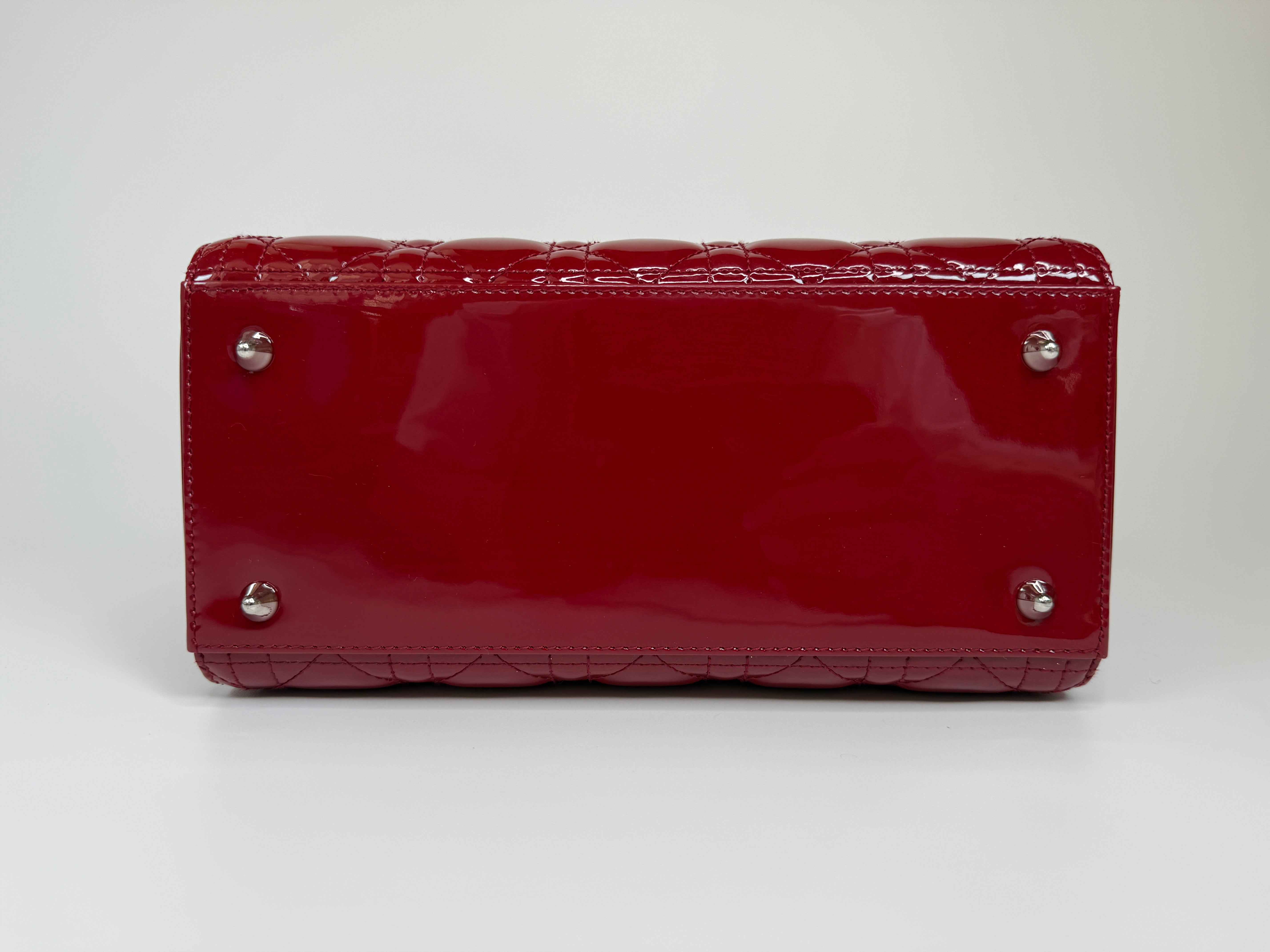 Christian Dior Medium Lady Dior In Patent Red Leather With Silver Hardware Authentic and preloved. 100% Authenticity Guarantee 