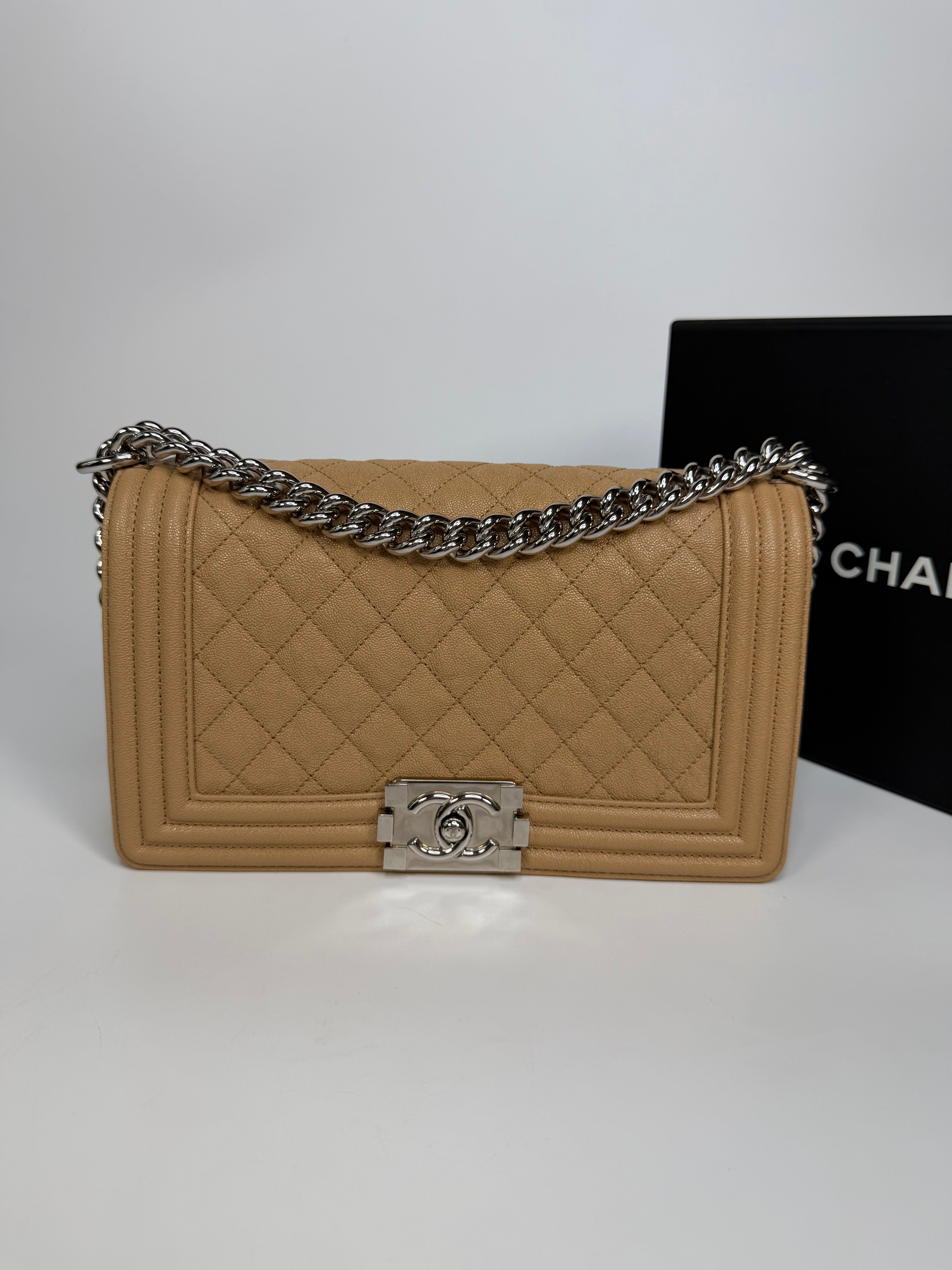 Chanel Medium Boy Bag Beige Caviar With Silver Hardware. Authentic and preloved in excellent condition