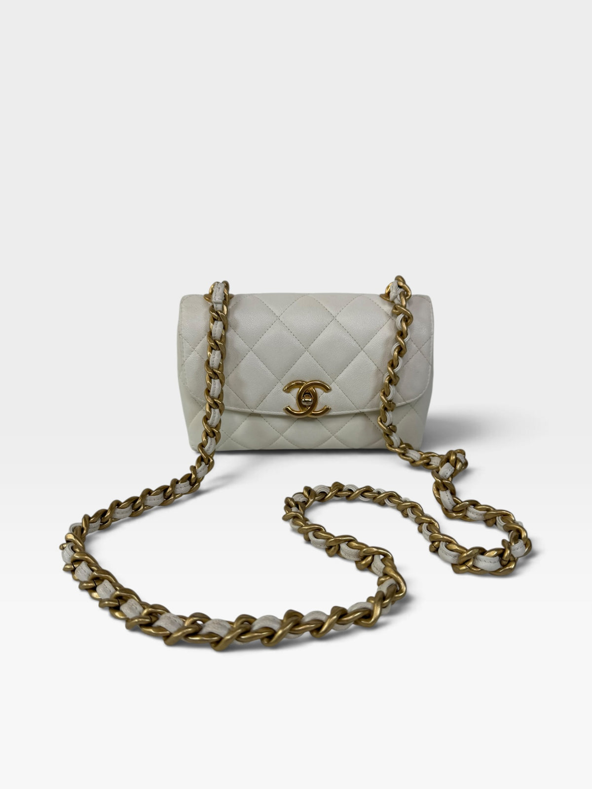 Chanel Mini Flap In White Caviar Leather With Gold Hardware 100% authentic and preloved in excellent condition