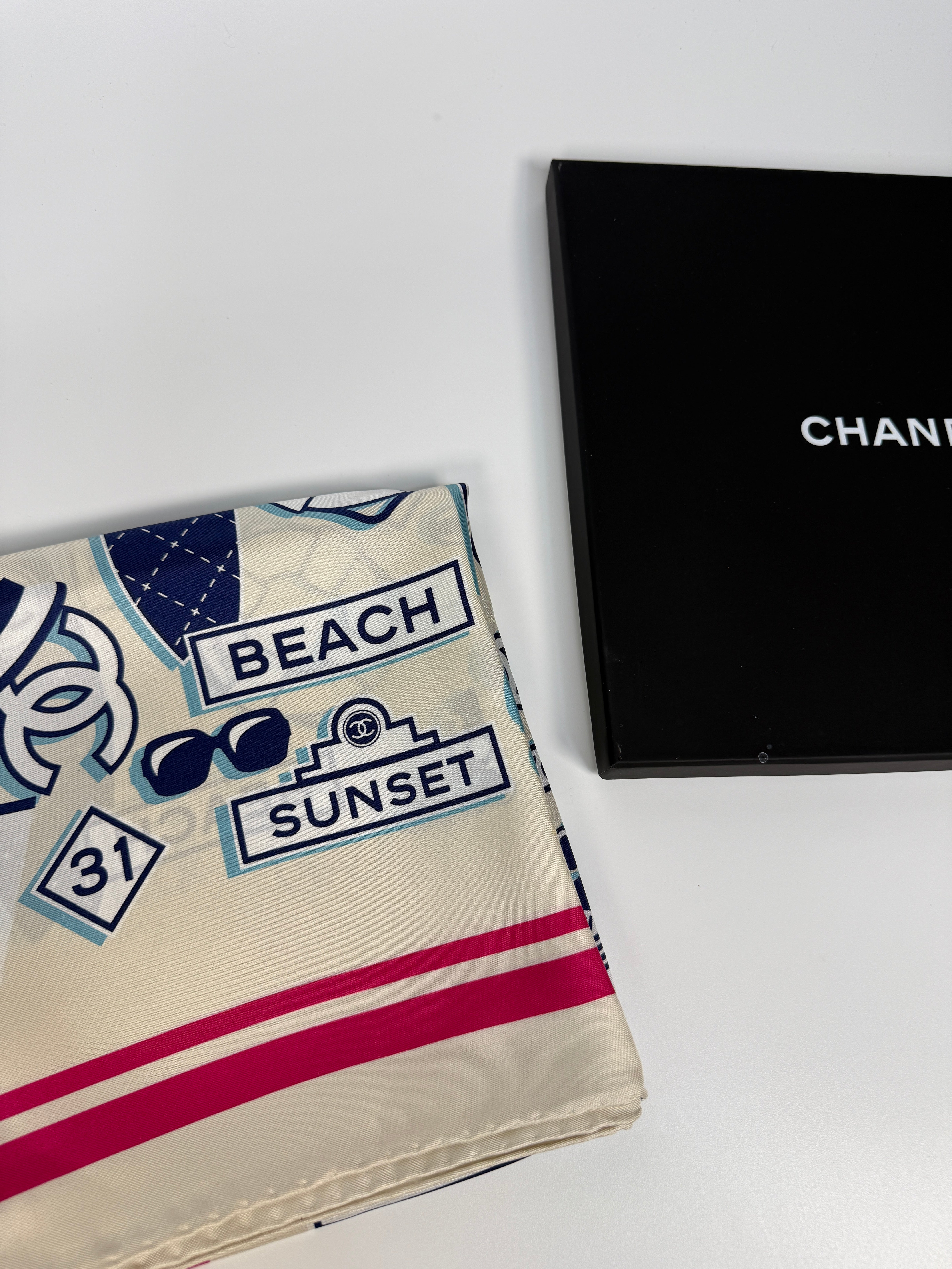 Authentic and preloved Chanel CC Silk Square Scarf In Excellent condition. 100% Authenticity Guarantee 