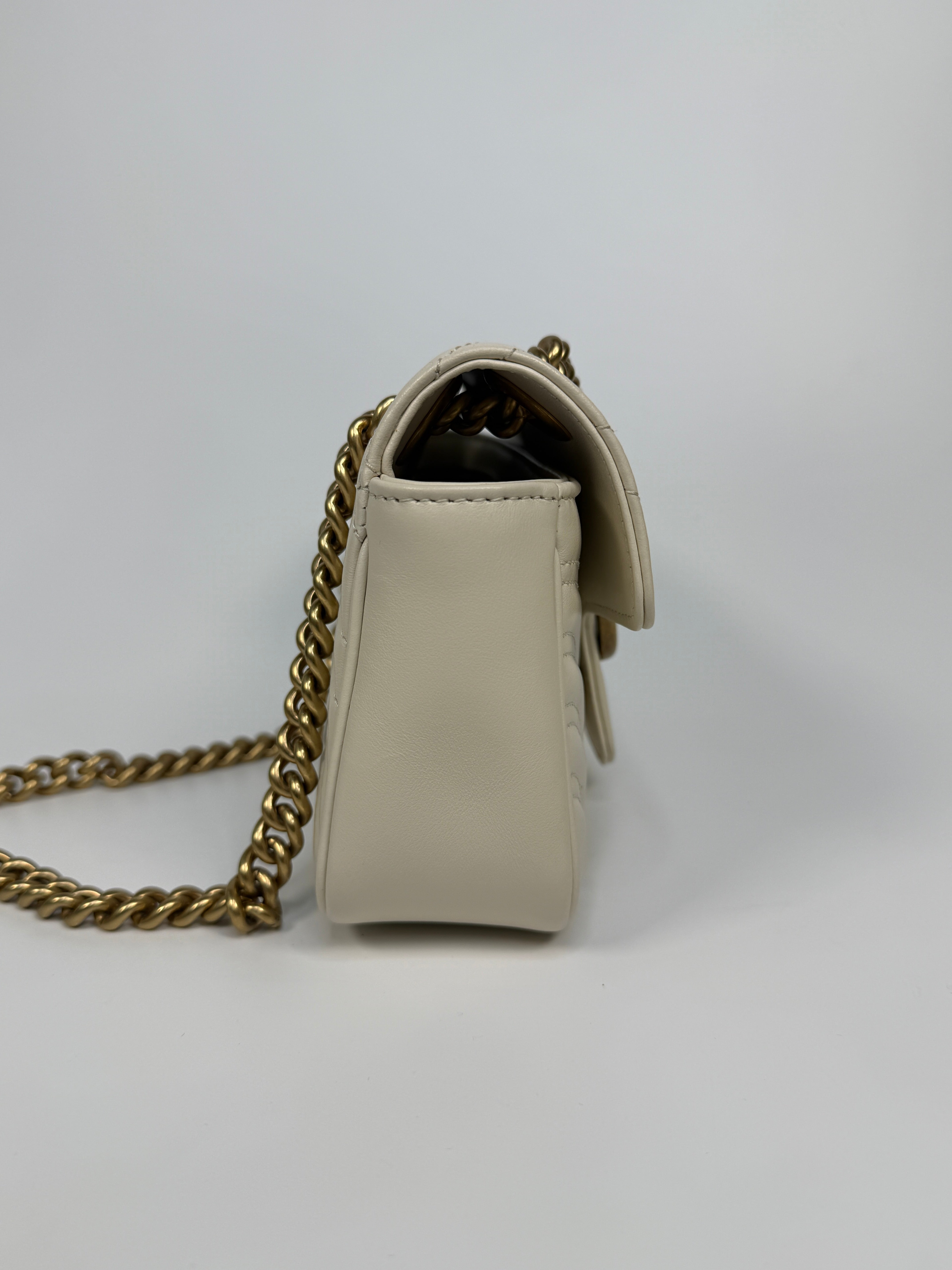 Gucci GG Small Marmont Matelasse Shoulder Bag In Ivory Leather With Gold Hardware 