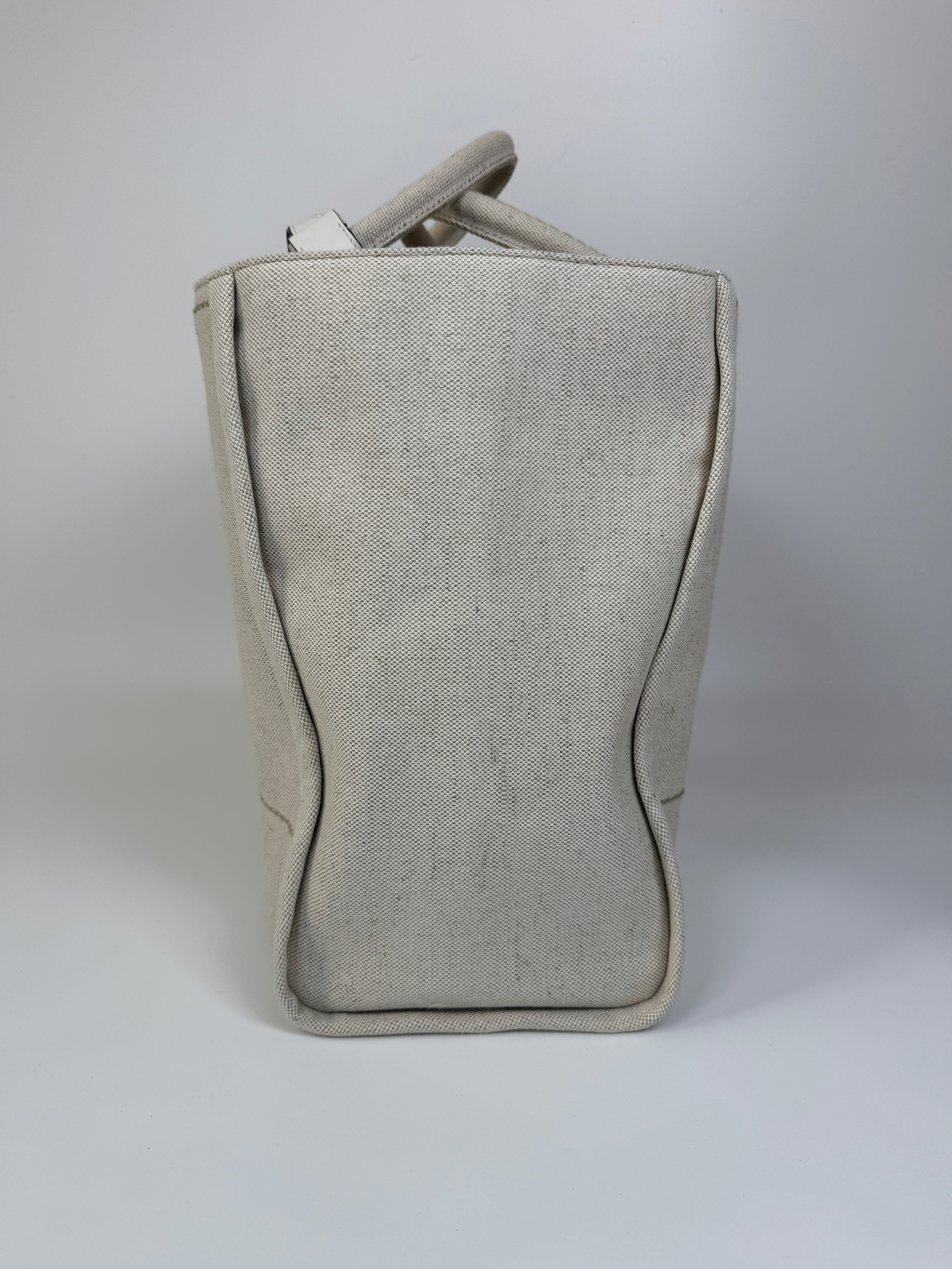 Authentic and preloved Prada Large Appliqué Cotton Tote In Sand Beige Canvas. Excellent Condition. 100% Authenticity guarantee. 