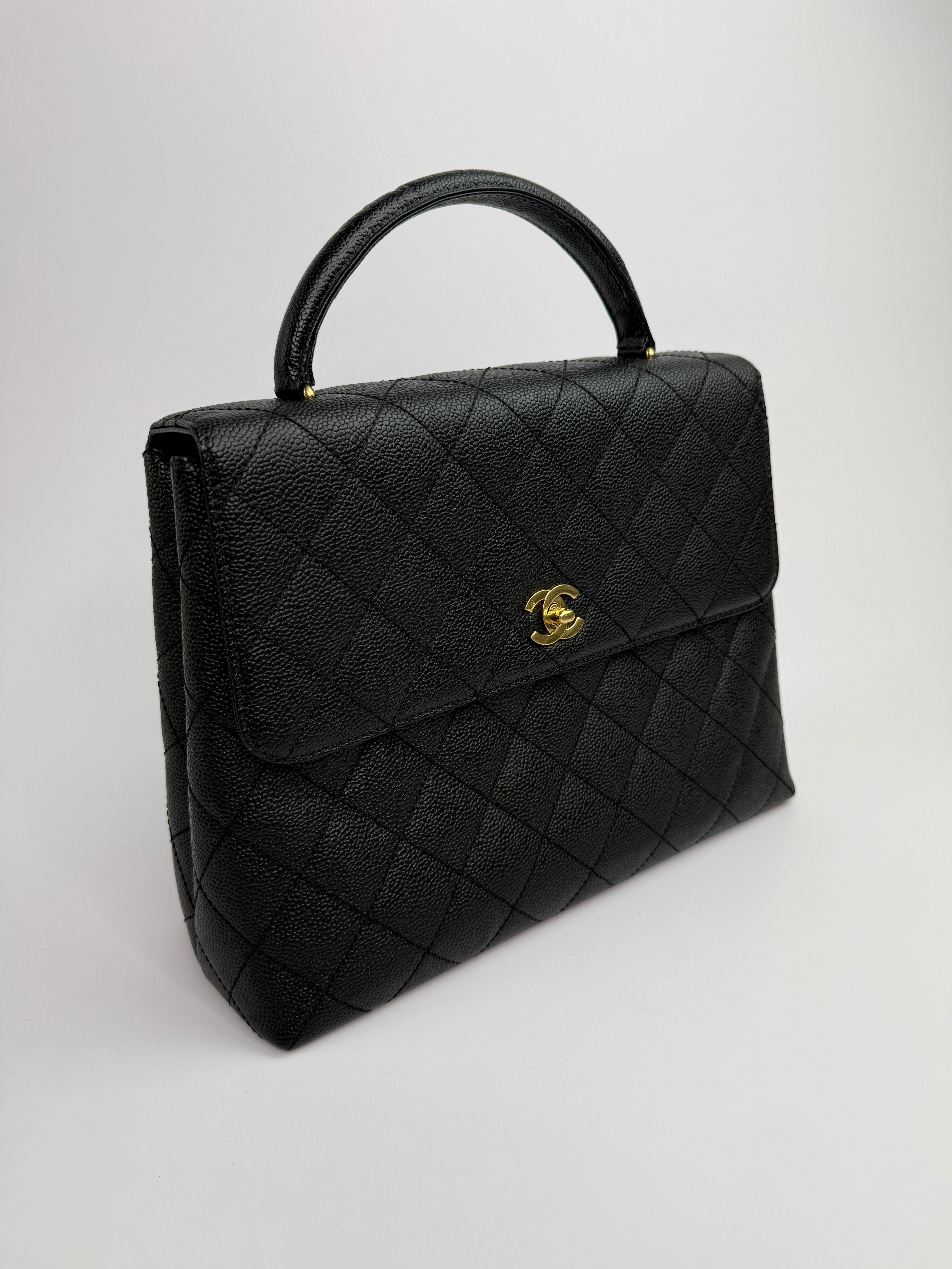 Chanel Vintage Black Caviar Kelly Top Handle
Pre Loved & Authentic 