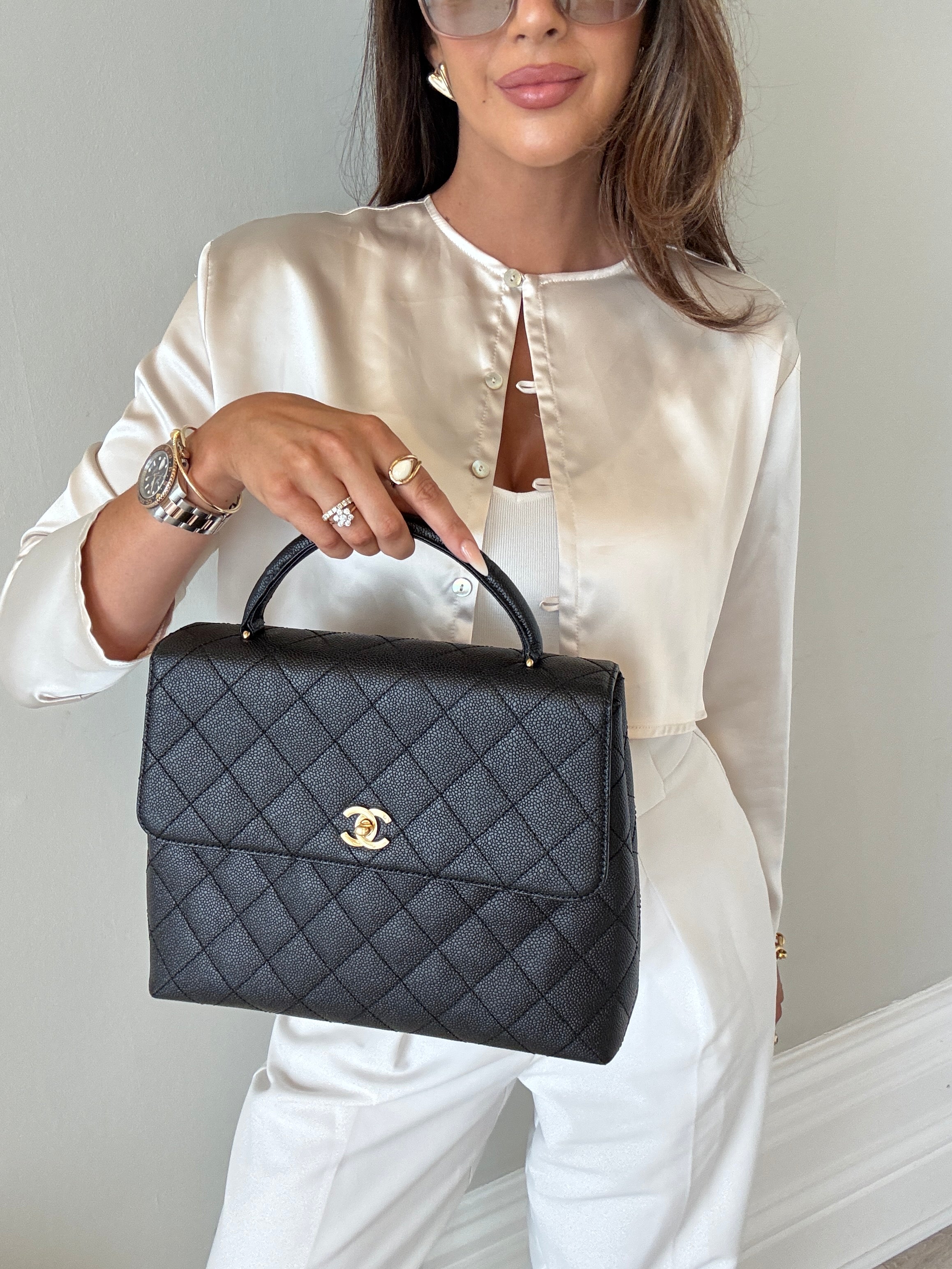 Chanel Vintage Black Caviar Kelly Top Handle
Pre Loved & Authentic 