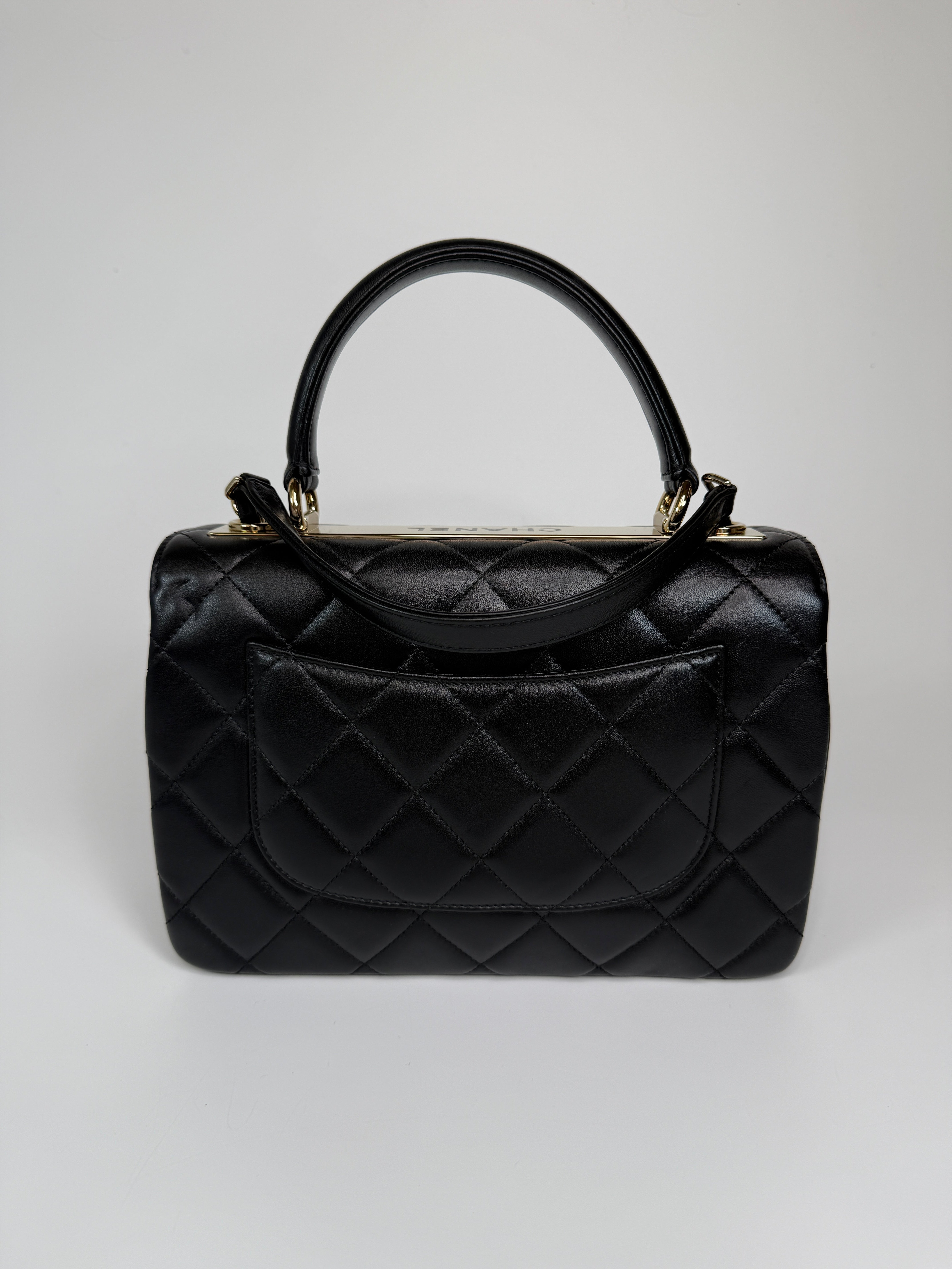 Authentic and preloved Chanel Trendy Top Handle Flap Bag In Black Lambskin With Gold Hardware. Excellent condition. 100% Authenticity guarantee 