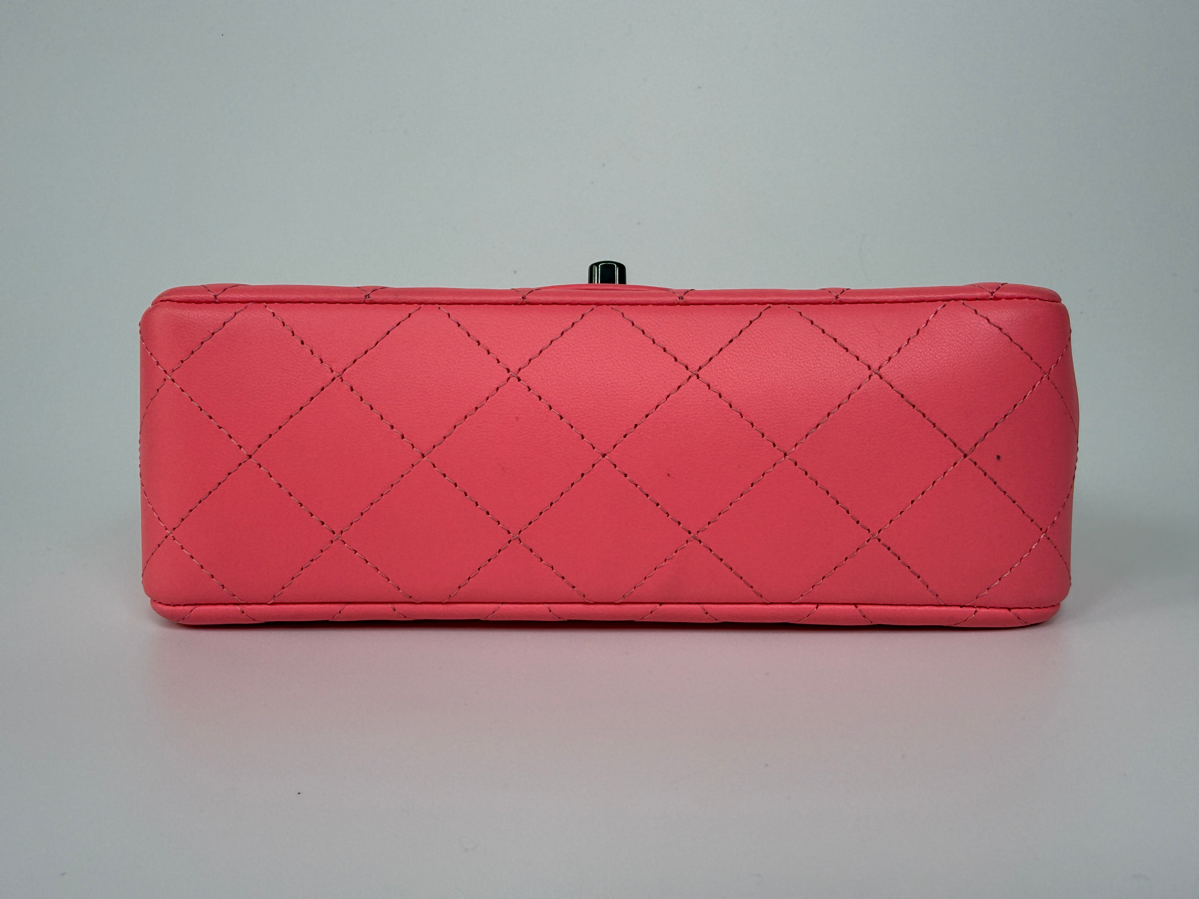 Chanel Mini Rectangle Flap Bag In Pink Lambskin With Black Hardware In Excellent Condition. Authentic and preloved. 