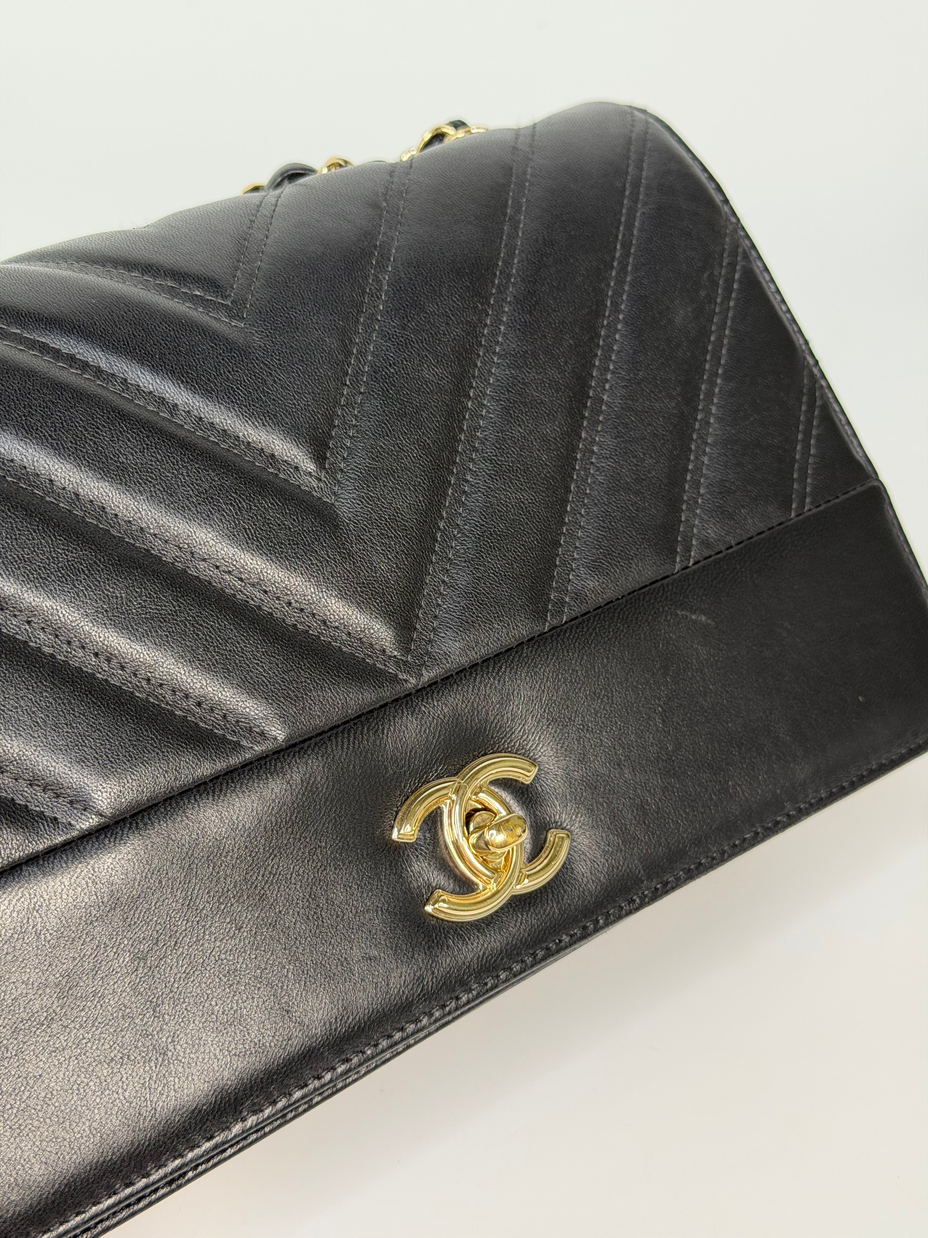 Chanel Chevron Flap In Black Lambskin Leather With Gold Hardware. Authentic and preloved in excellent condition. 100% guarantee