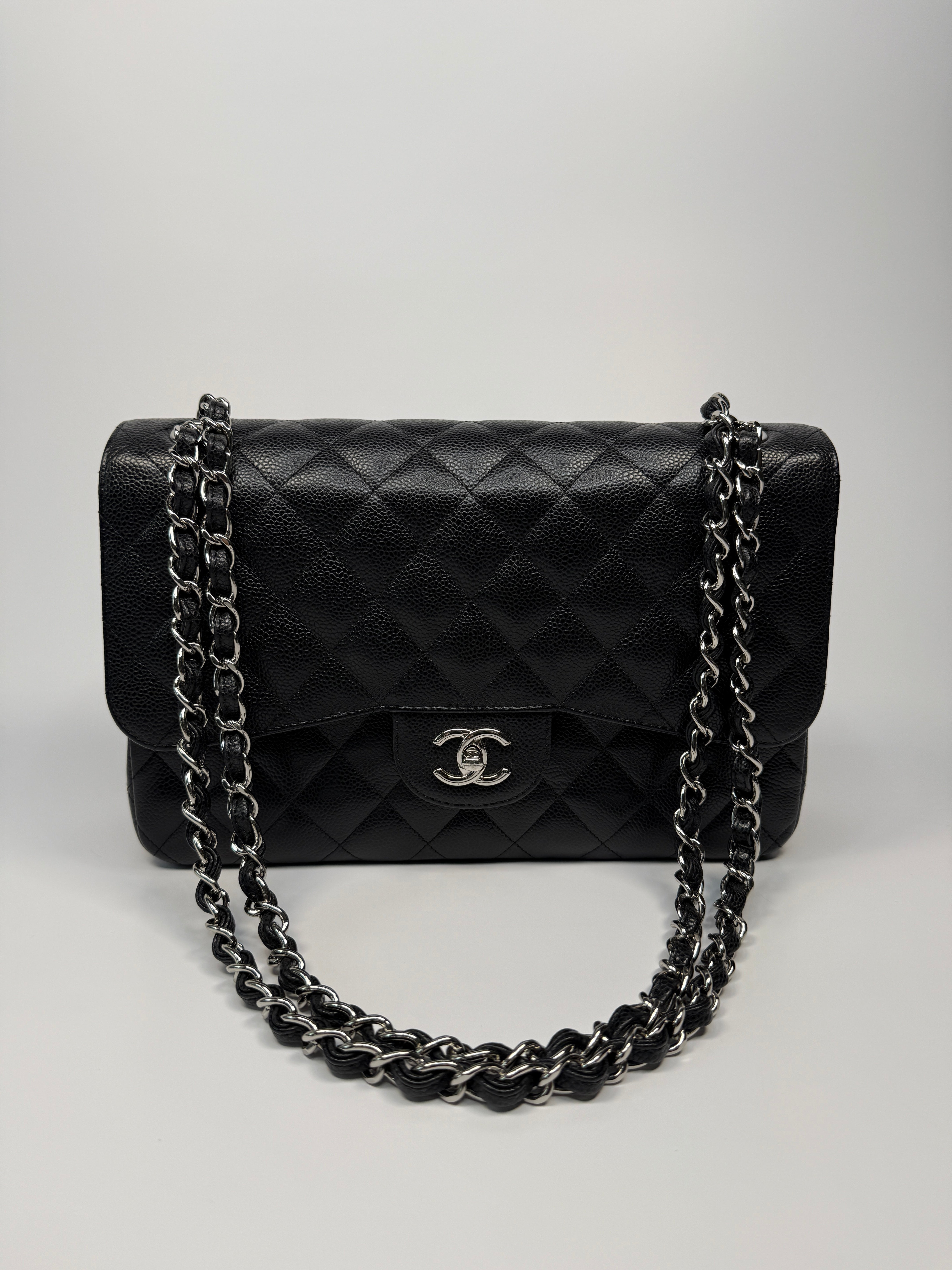 Chanel Black Caviar Leather Jumbo Classic Double Flap Silver Hardware
Pre Loved & Authentic 