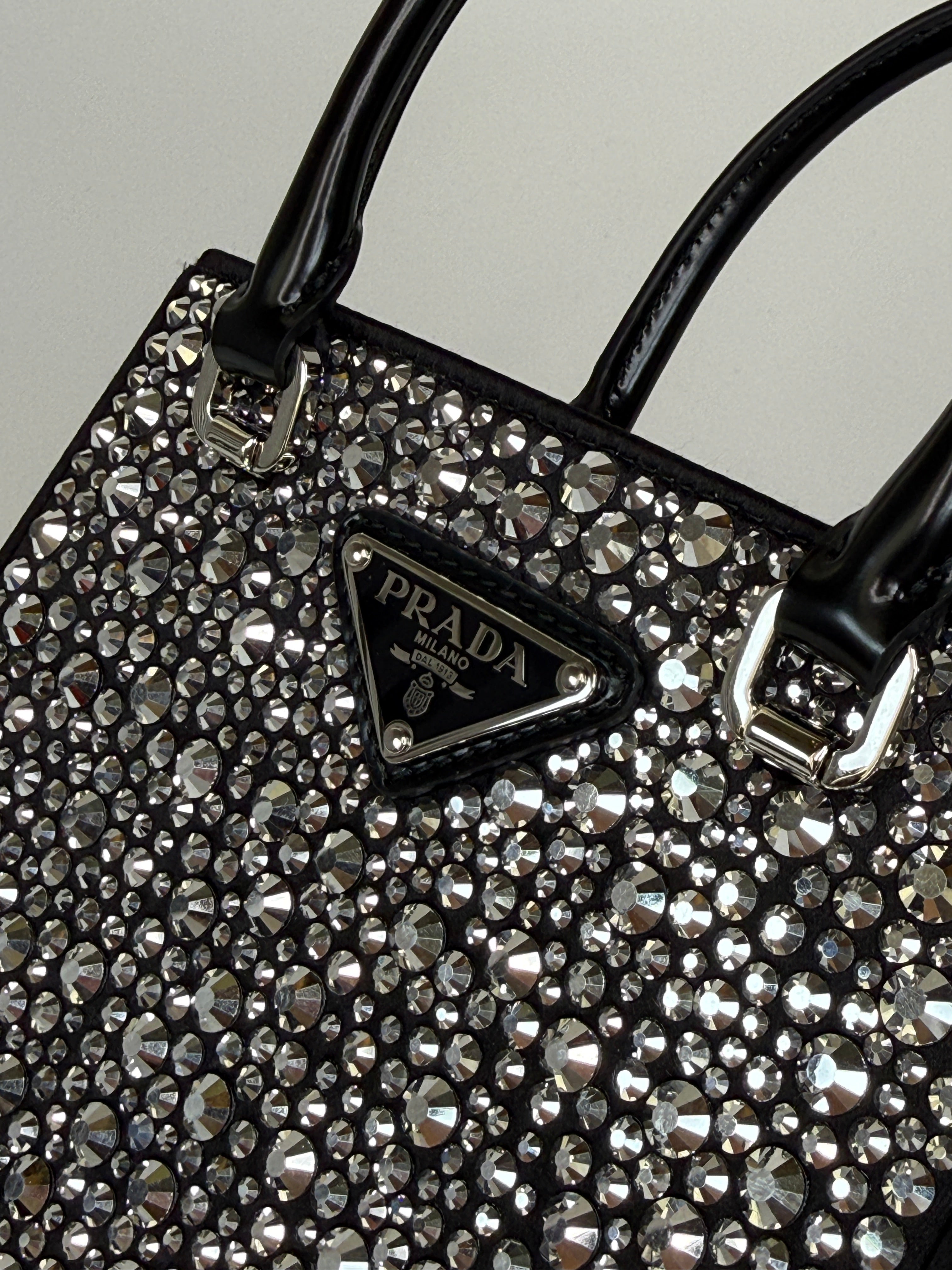 Prada Mini Tote In Black Crystal Leather With Silver Hardware Excellent Condition. 100% Authenticity guarantee. 