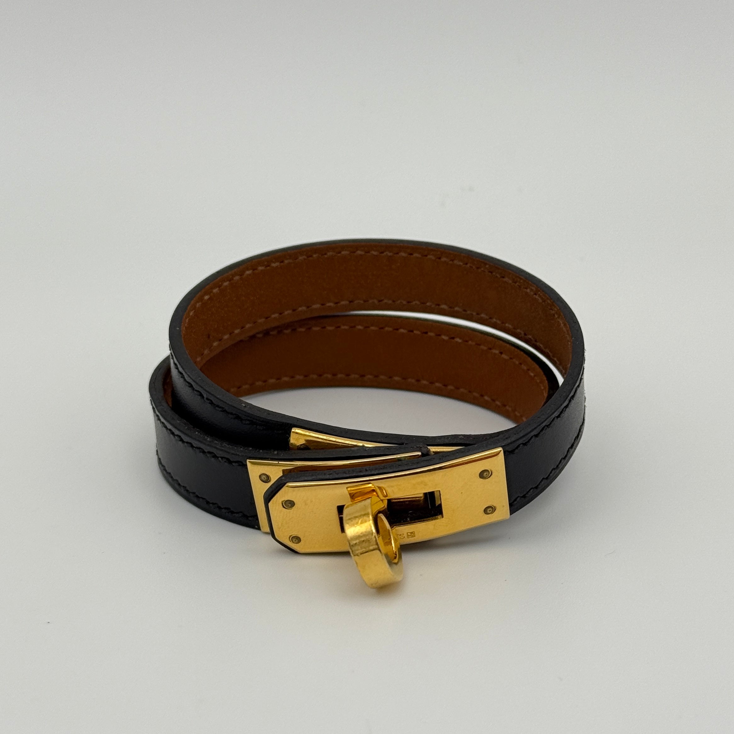Hermès Kelly Double Tour Bracelet in black leather with gold hardware 