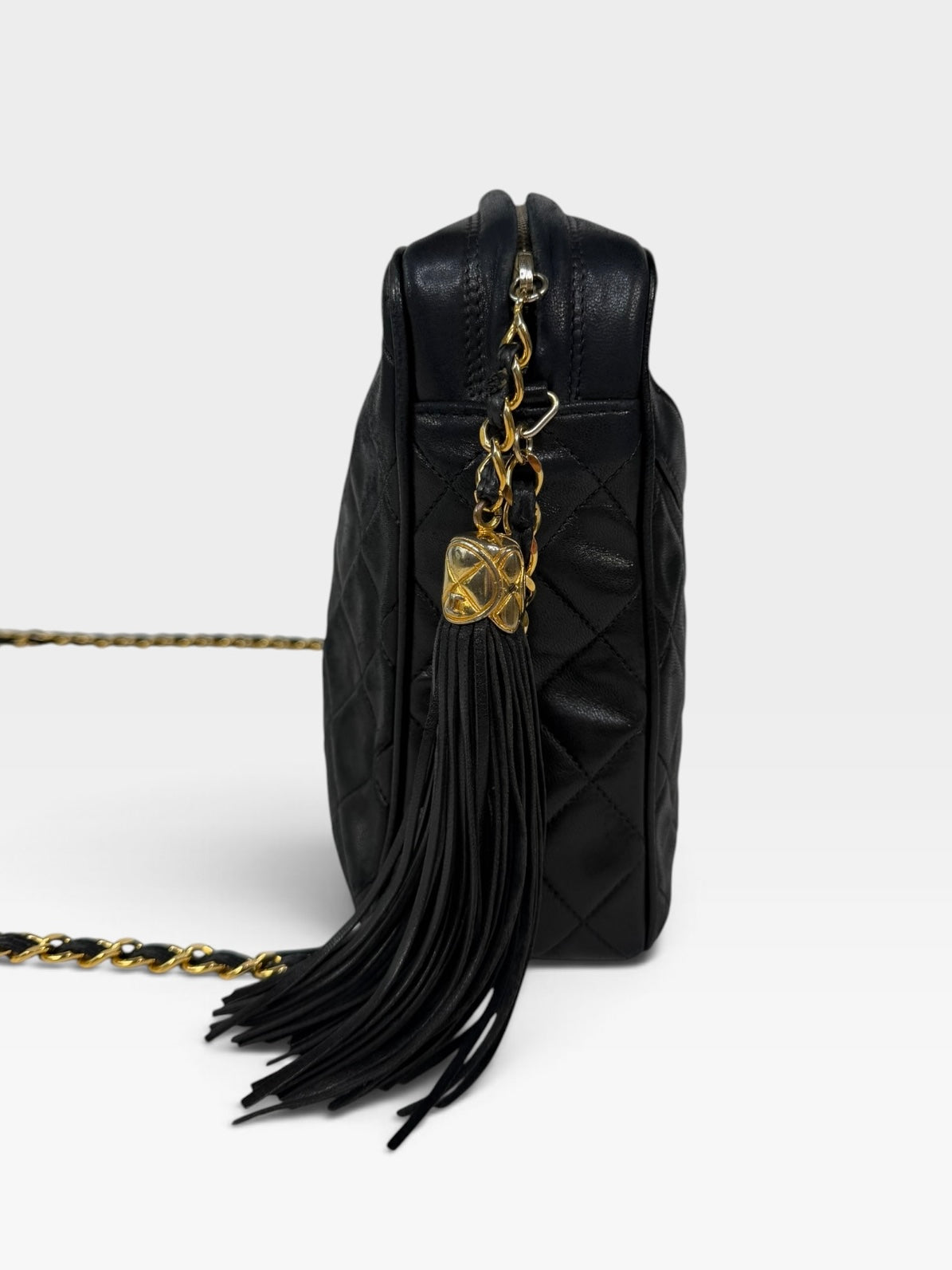Chanel Vintage Quilted Camera Bag In Black Lambskin With 24kt Gold Hardware 100% authentic and preloved in excellent condition