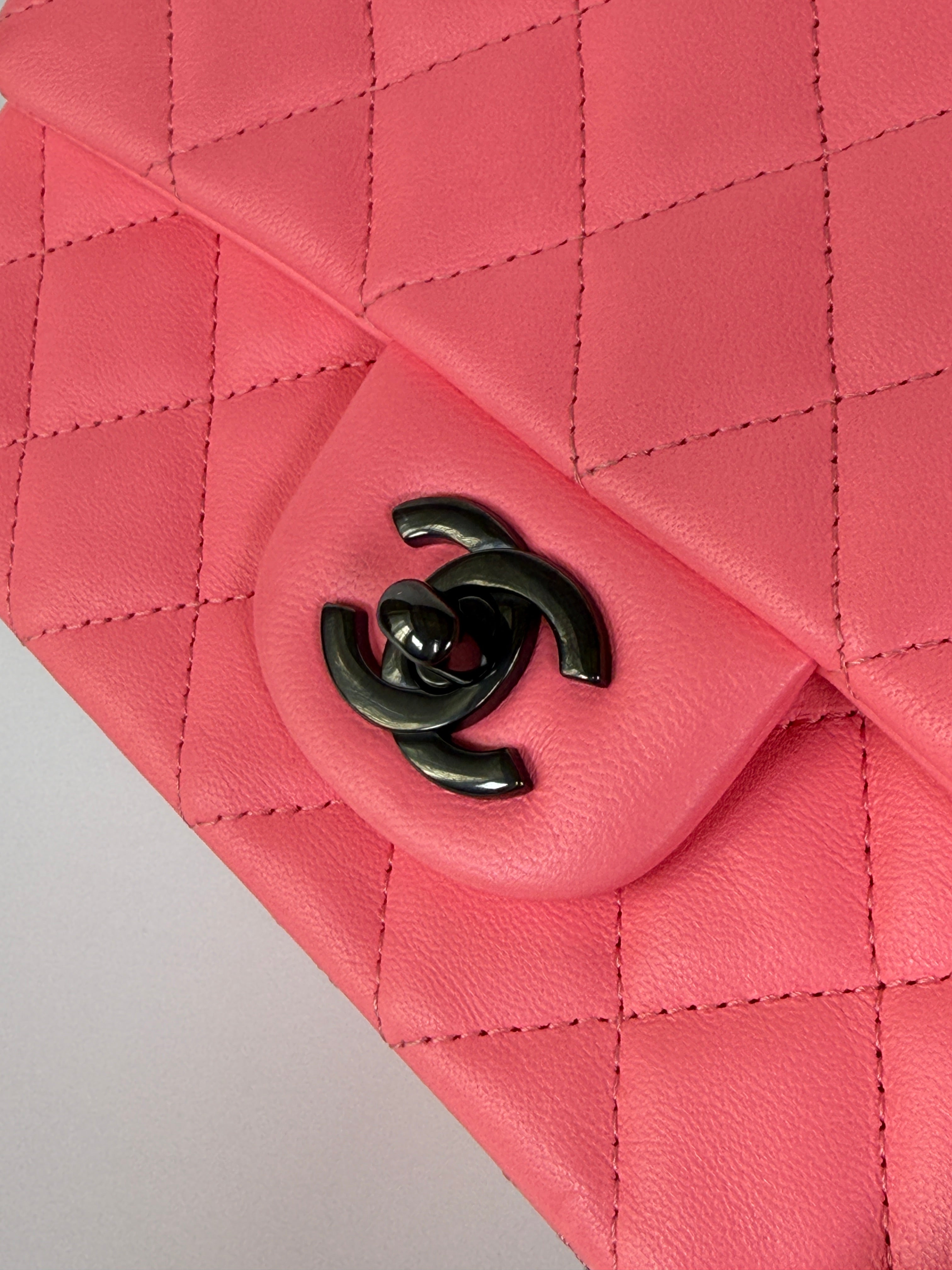 Chanel Mini Rectangle Flap Bag In Pink Lambskin With Black Hardware In Excellent Condition. Authentic and preloved. 