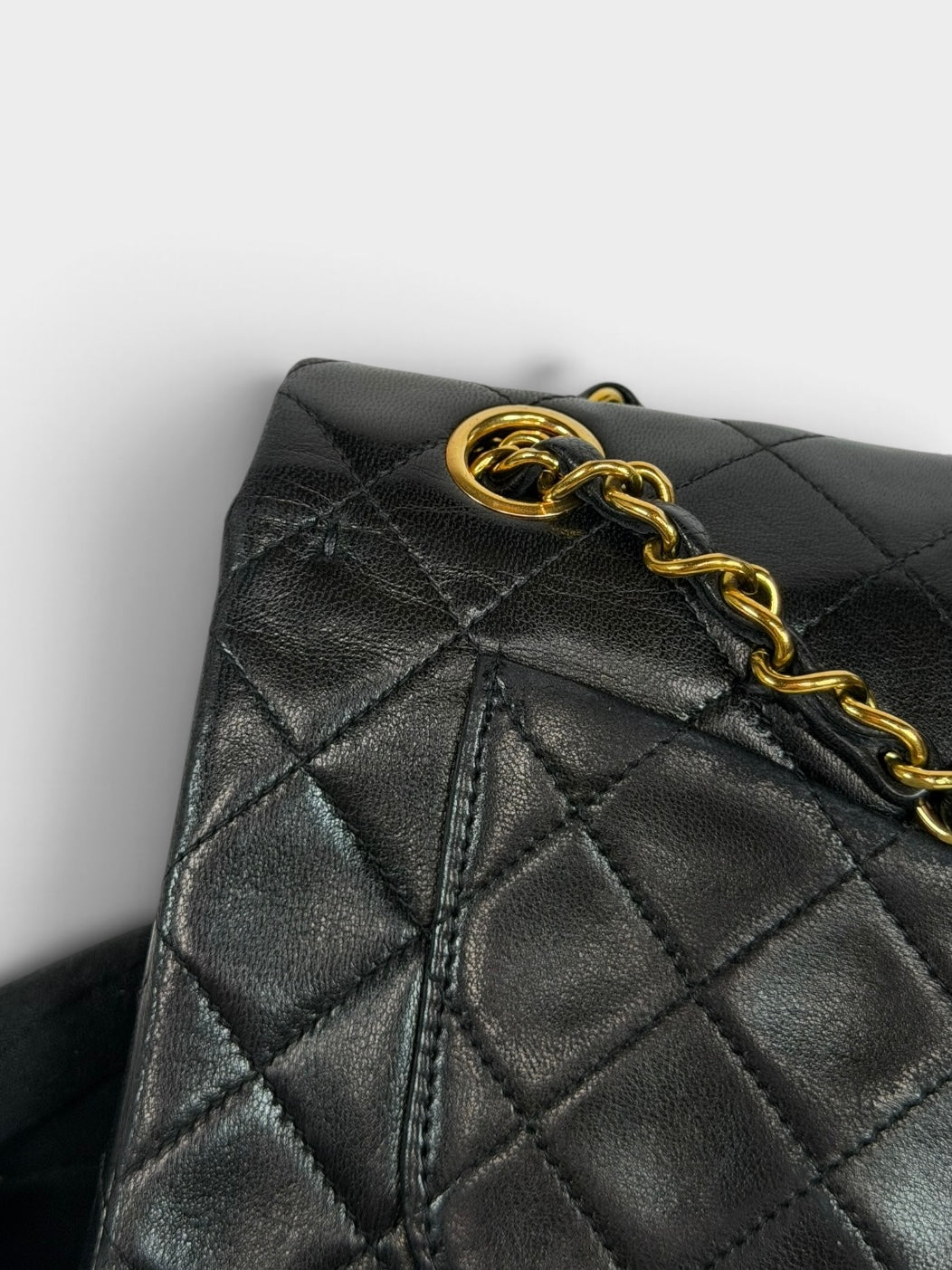 Chanel Vintage Small Classic Double Flap In Black Lambskin Leather 24Kt Hardware. Authentic and preloved in excellent condition. 100% guarantee