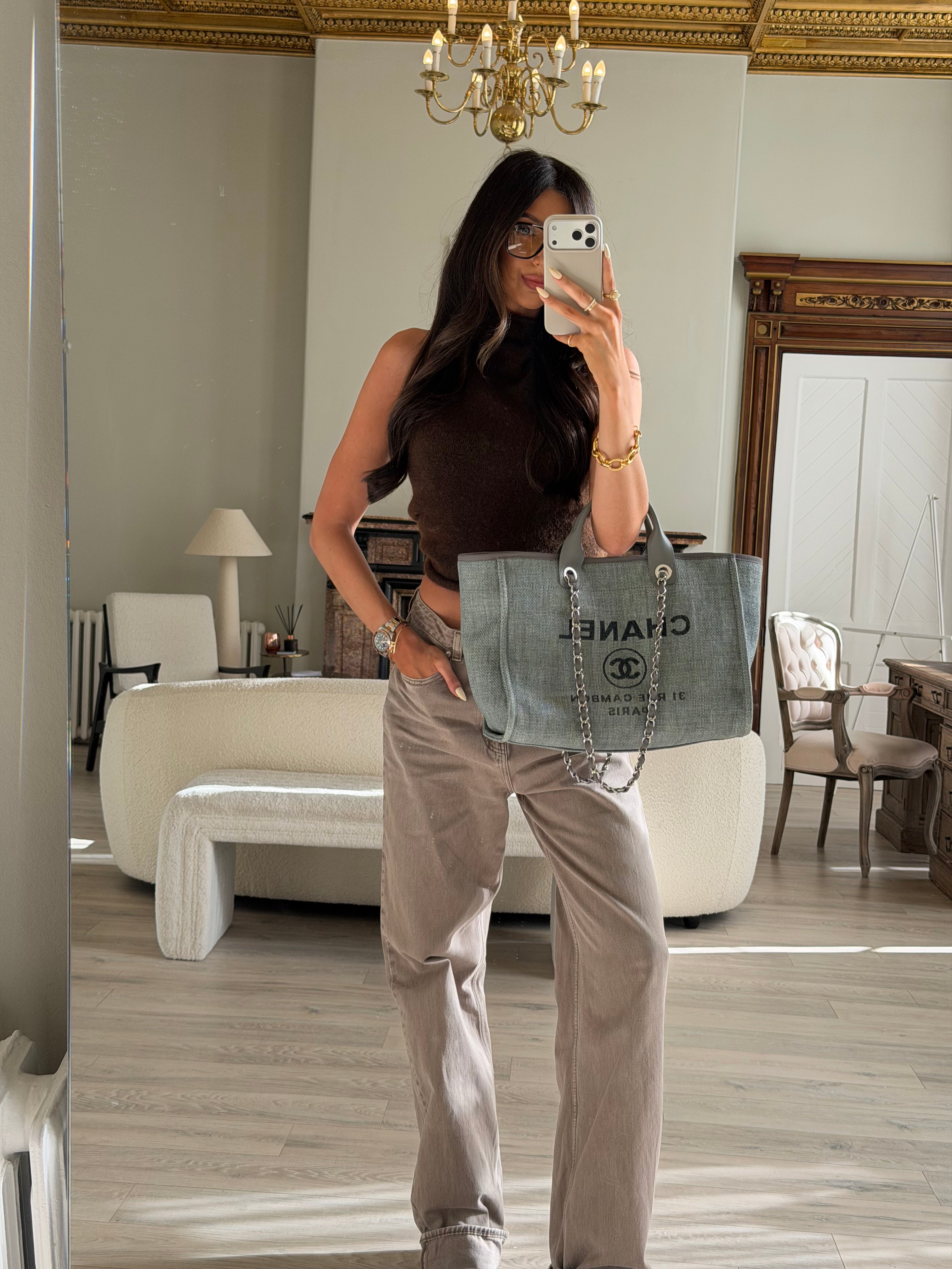 Authentic and preloved Chanel Medium Deauville Tote Bag In Mixed Fibers Rafia Silver Hardware. Excellent condition. 100% Authenticity guarantee 