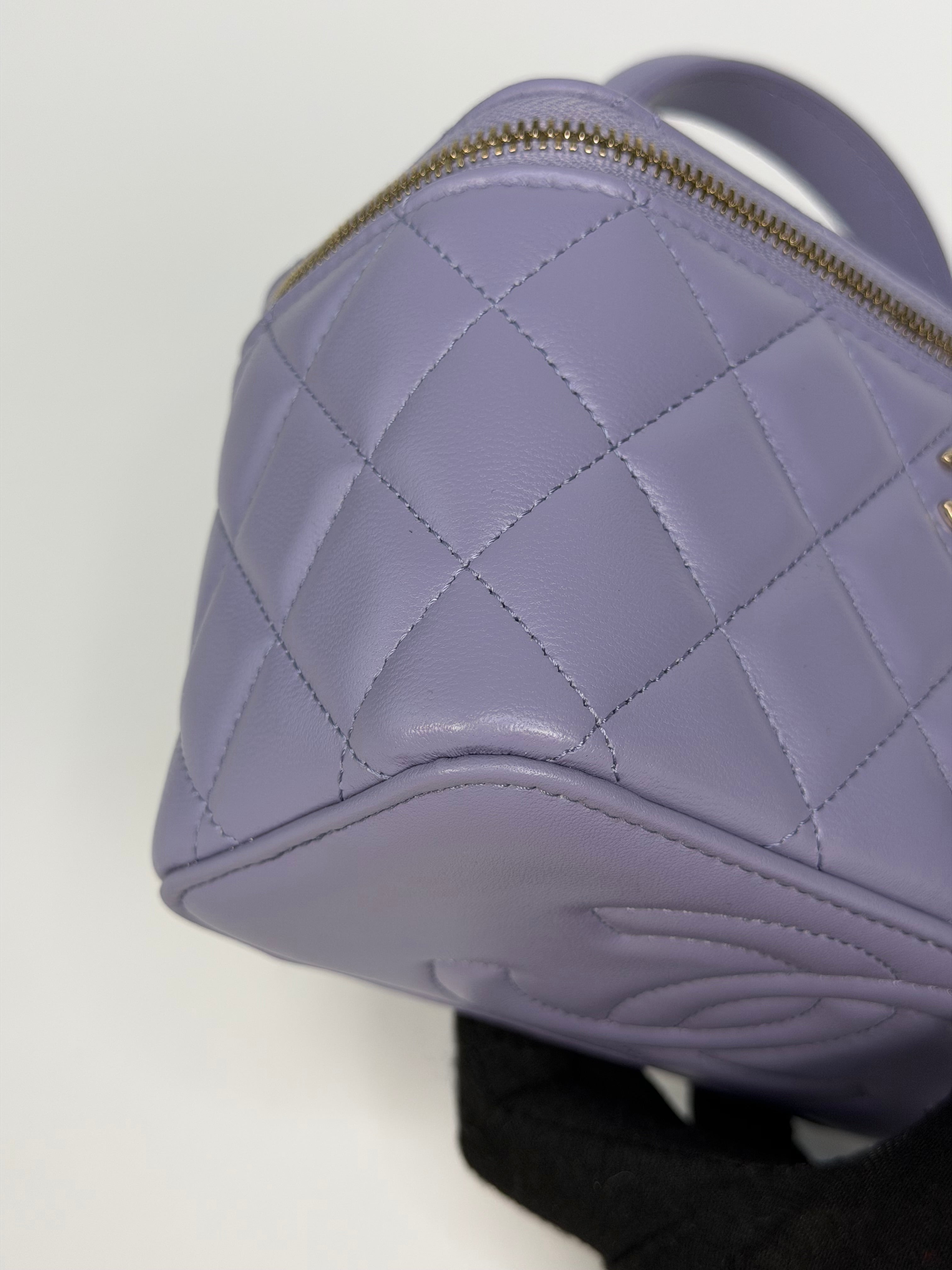 Chanel Mini Vanity Top Handle In Lilac Lambskin Leather With Gold Hardware. Authentic and preloved in excellent condition