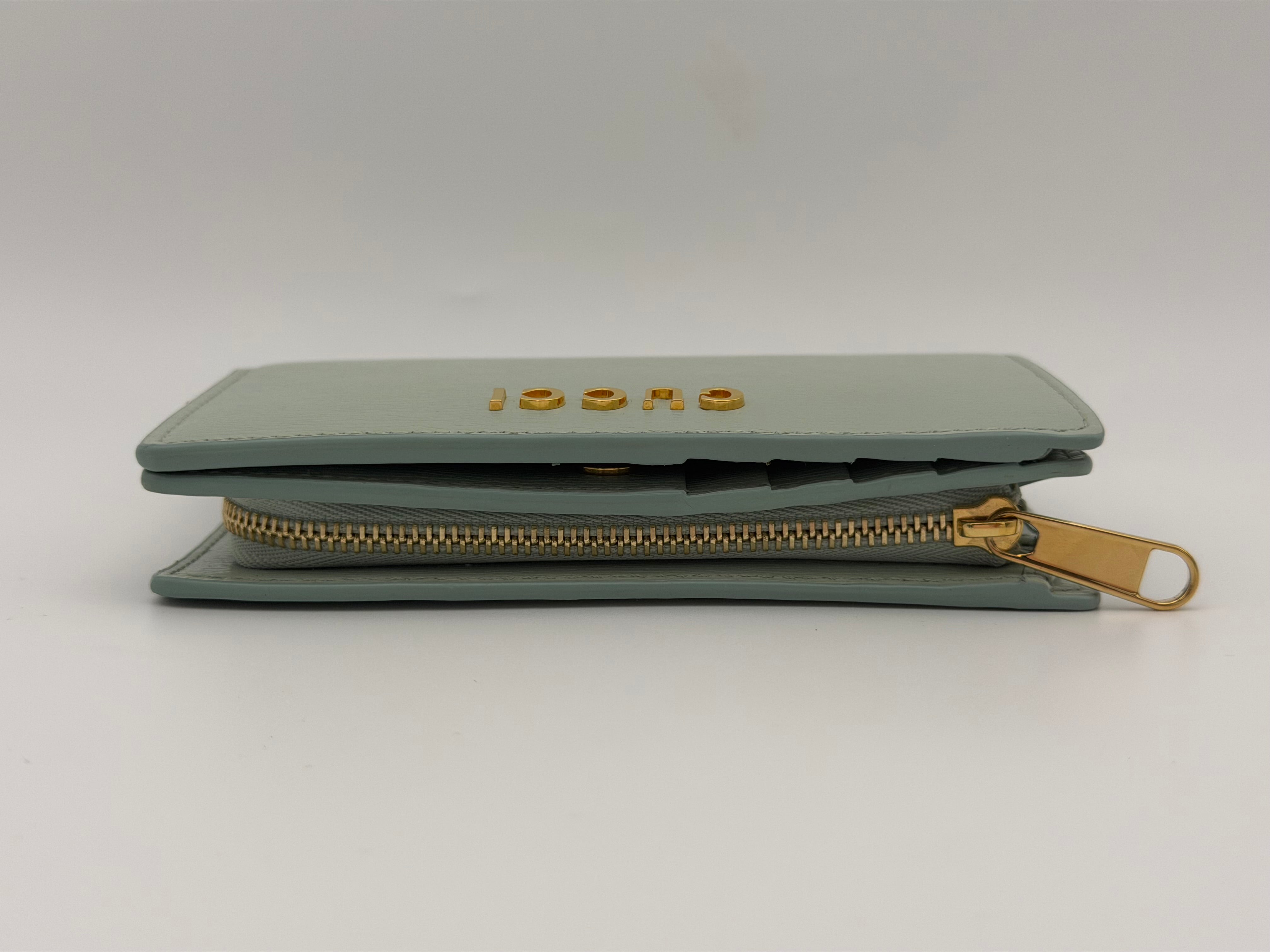 Gucci GG Embossed Wallet In Grey Leather With Gold Hardware. Authentic and preloved in excellent condition. Insured next day delivery. Verified by Luxe Cheshire.