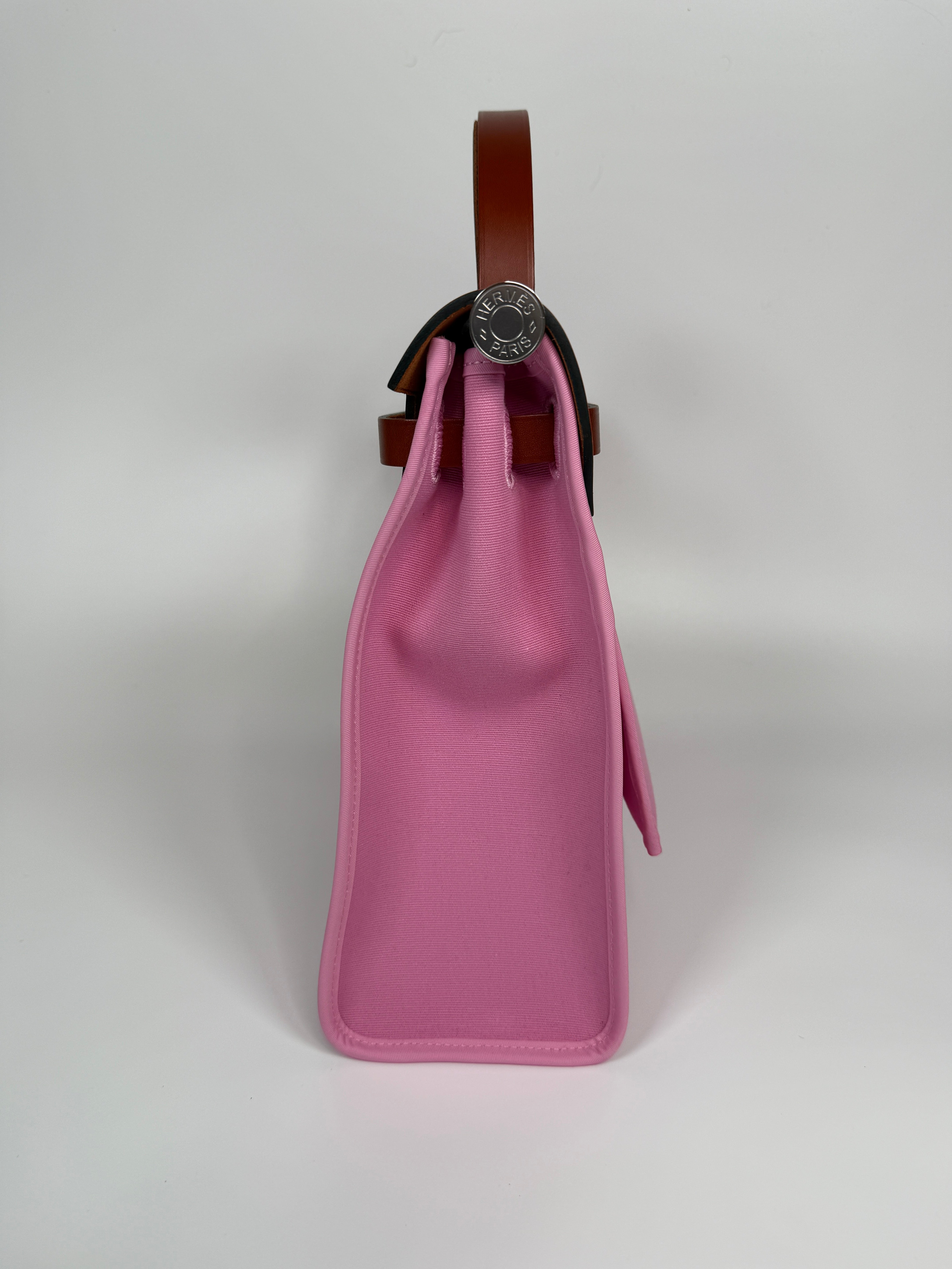 Hermès Herbag 31 Zip In Bubblegum & Cuivre Bag. New and Unused. Authentic and preloved. 100% Authenticity guarantee 