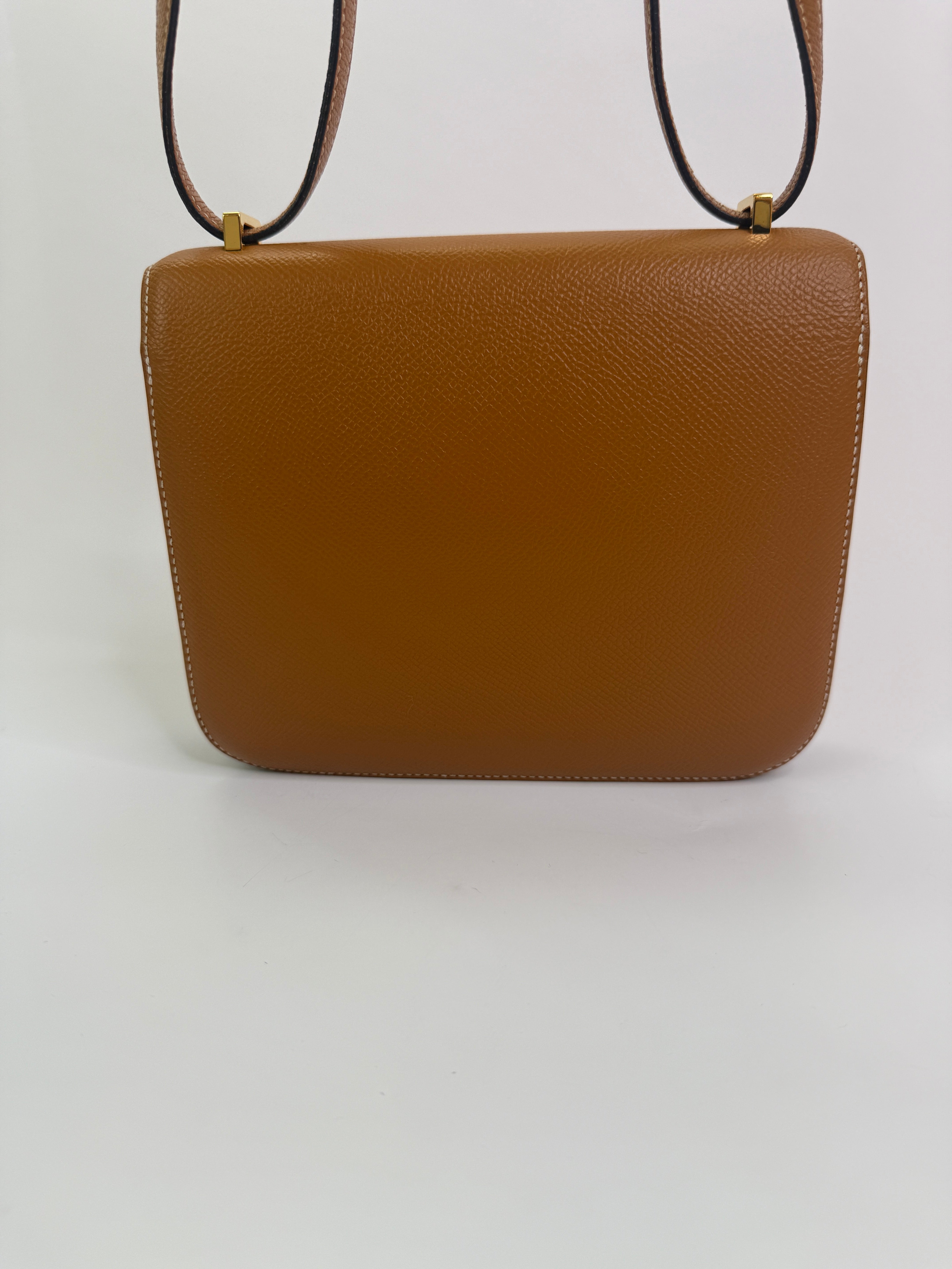 Authentic pre-lovedHermès Constance 18 In Toffee Epsom Leather With Gold Hardware. 
