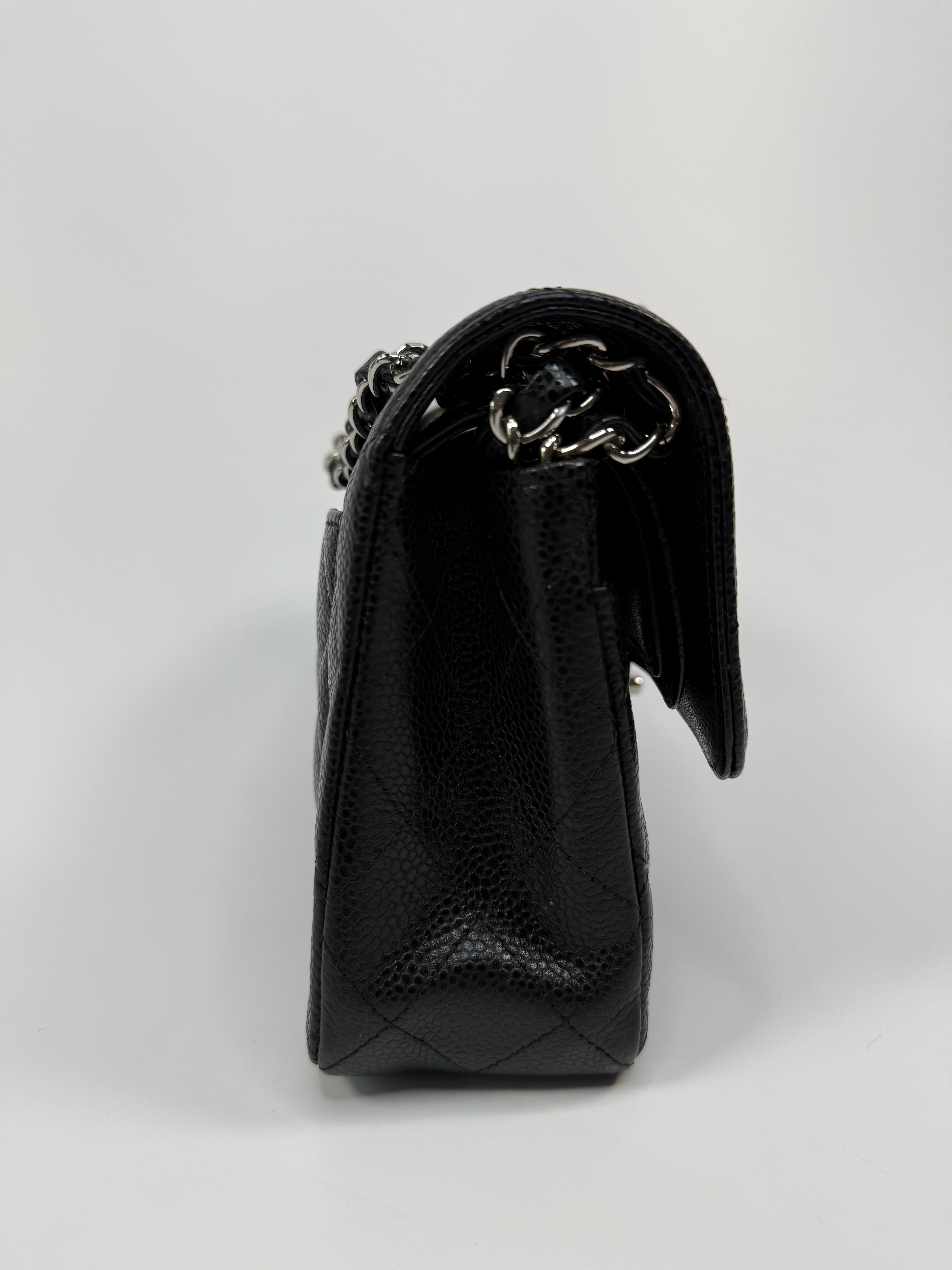 Chanel Small Classic Double Flap In Black Caviar Leather With Silver Hardware
Pre Loved & Authentic 