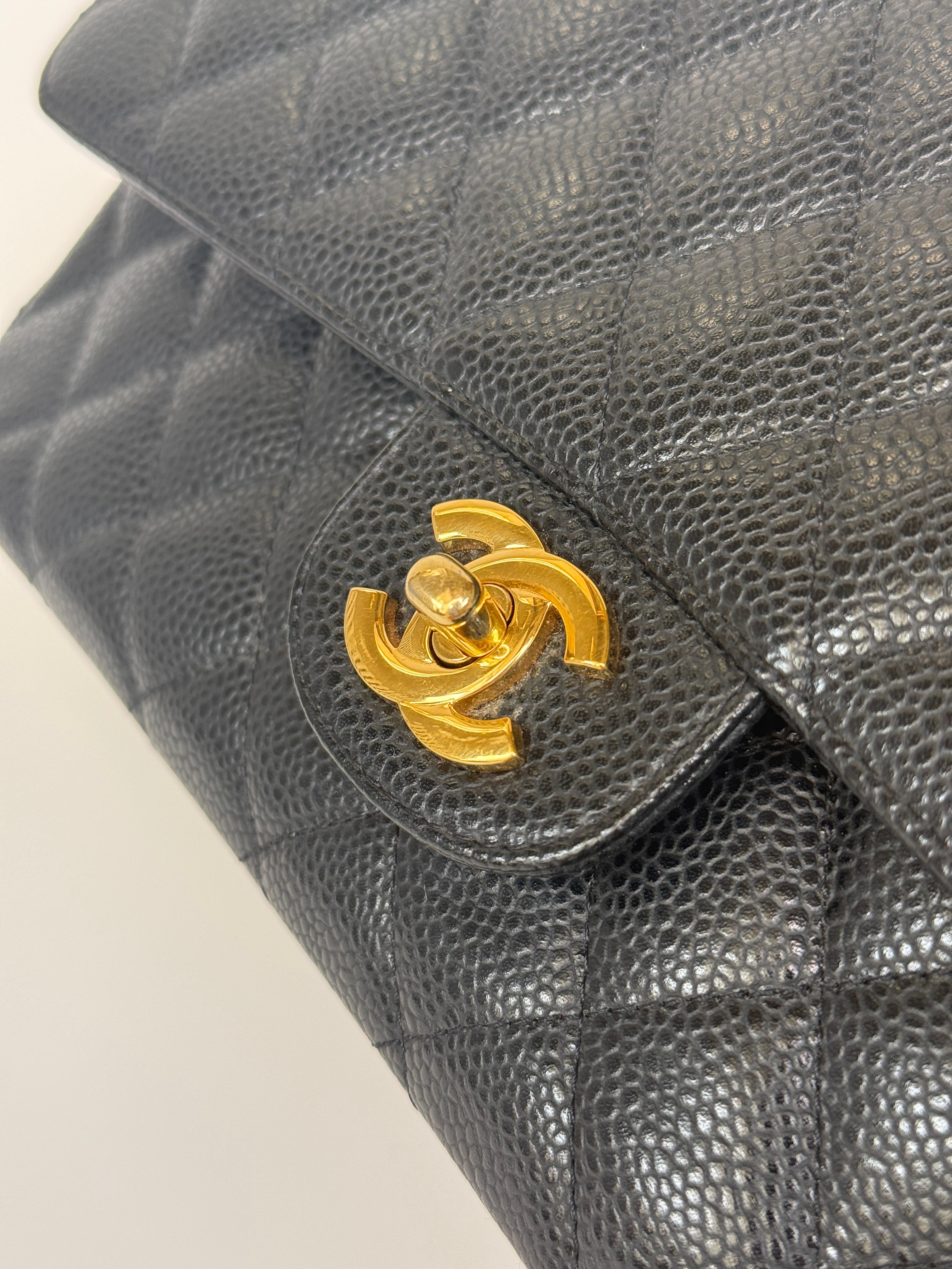 Chanel Medium Classic Double Flap Black Caviar Leather With Gold Hardware. Authentic and preloved. 100% Authenticity guarantee 