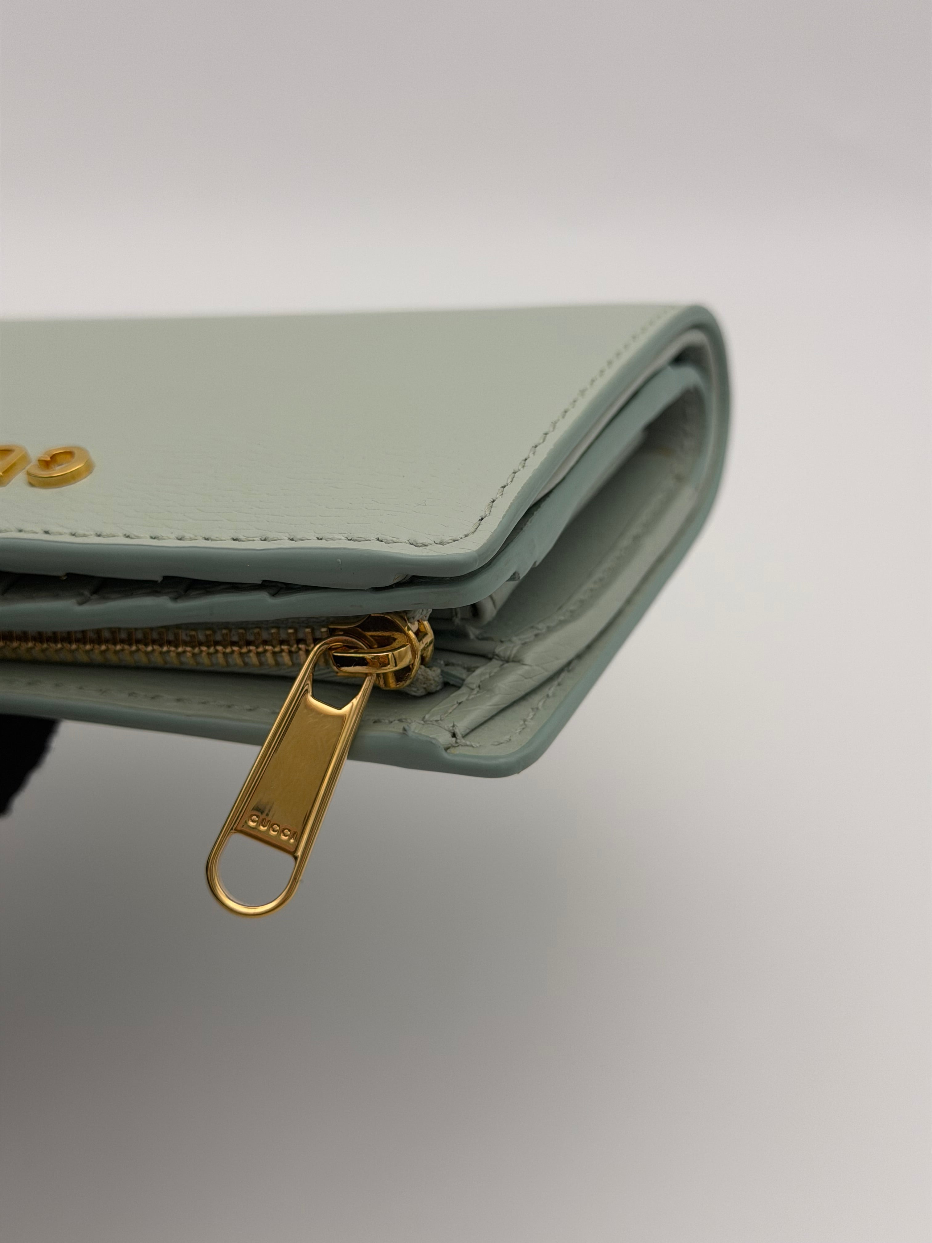 Gucci GG Embossed Wallet In Grey Leather With Gold Hardware. Authentic and preloved in excellent condition. Insured next day delivery. Verified by Luxe Cheshire.