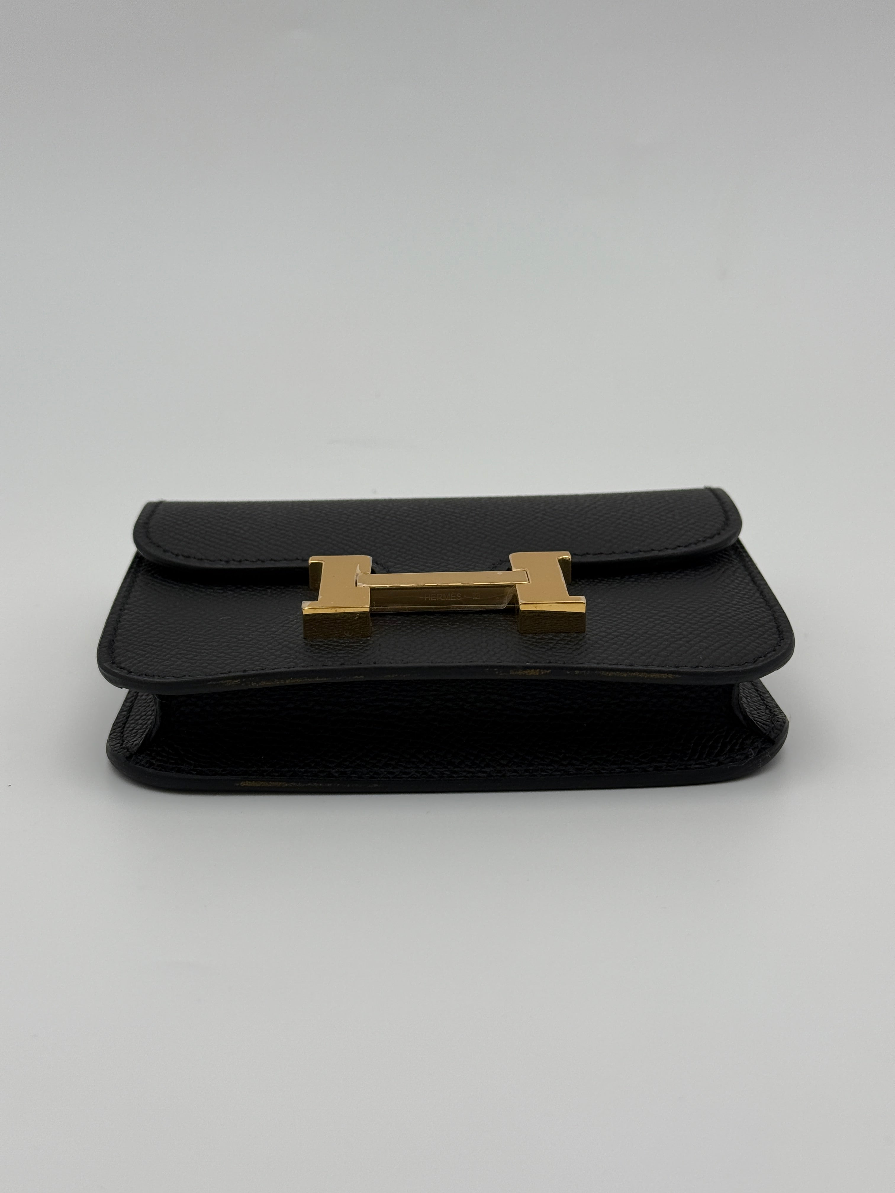 Authentic Pre Loved Hermès Constance Slim Wallet In Black Epsom Leather With Gold Hardware New & Unused Condition