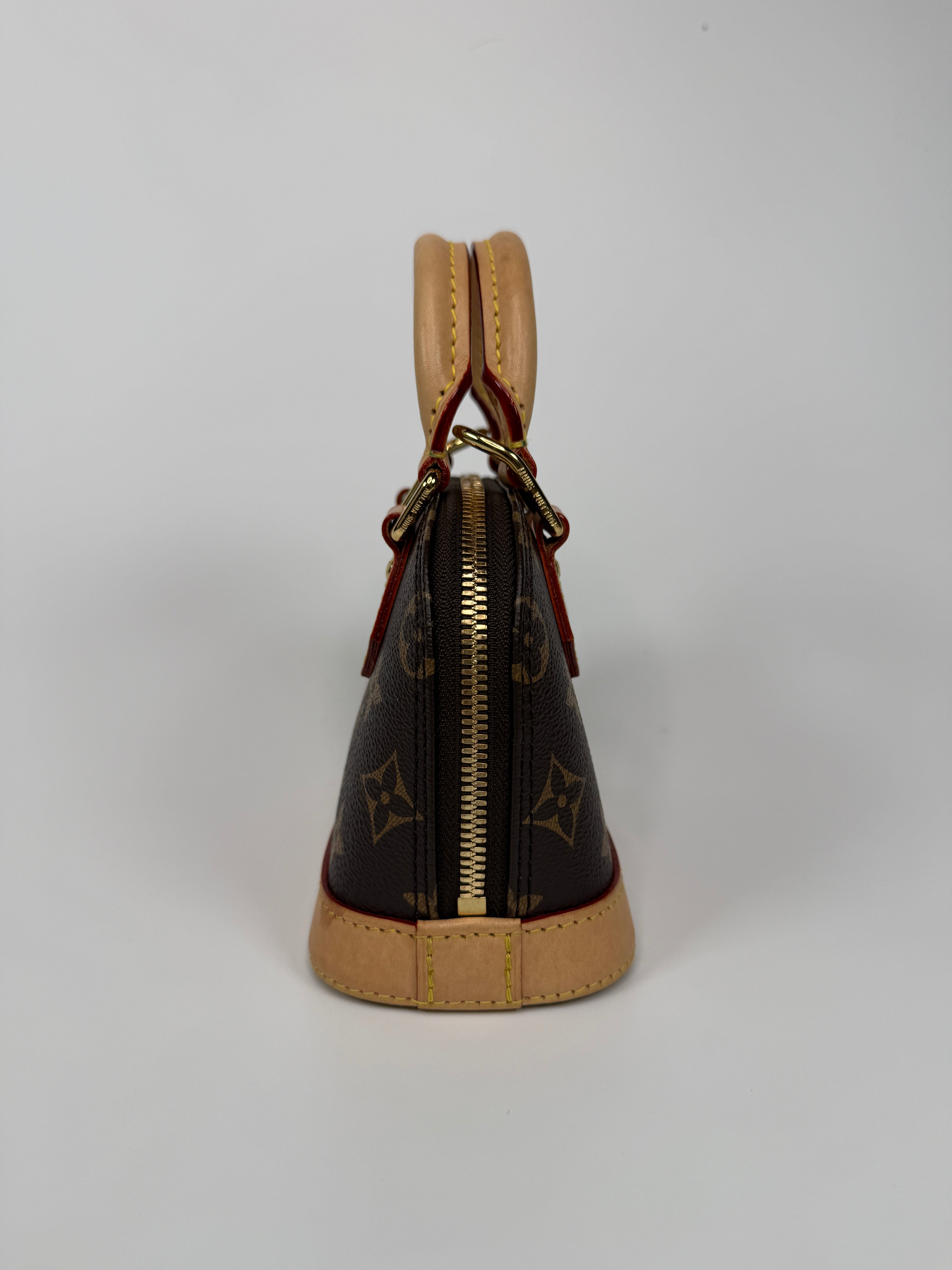 Authentic and preloved Louis Vuitton X Takashi Murakami Nano Alma Cherry Brown Monogram. Excellent condition. 100% Authenticity guarantee. Verified by Luxe Cheshire. 