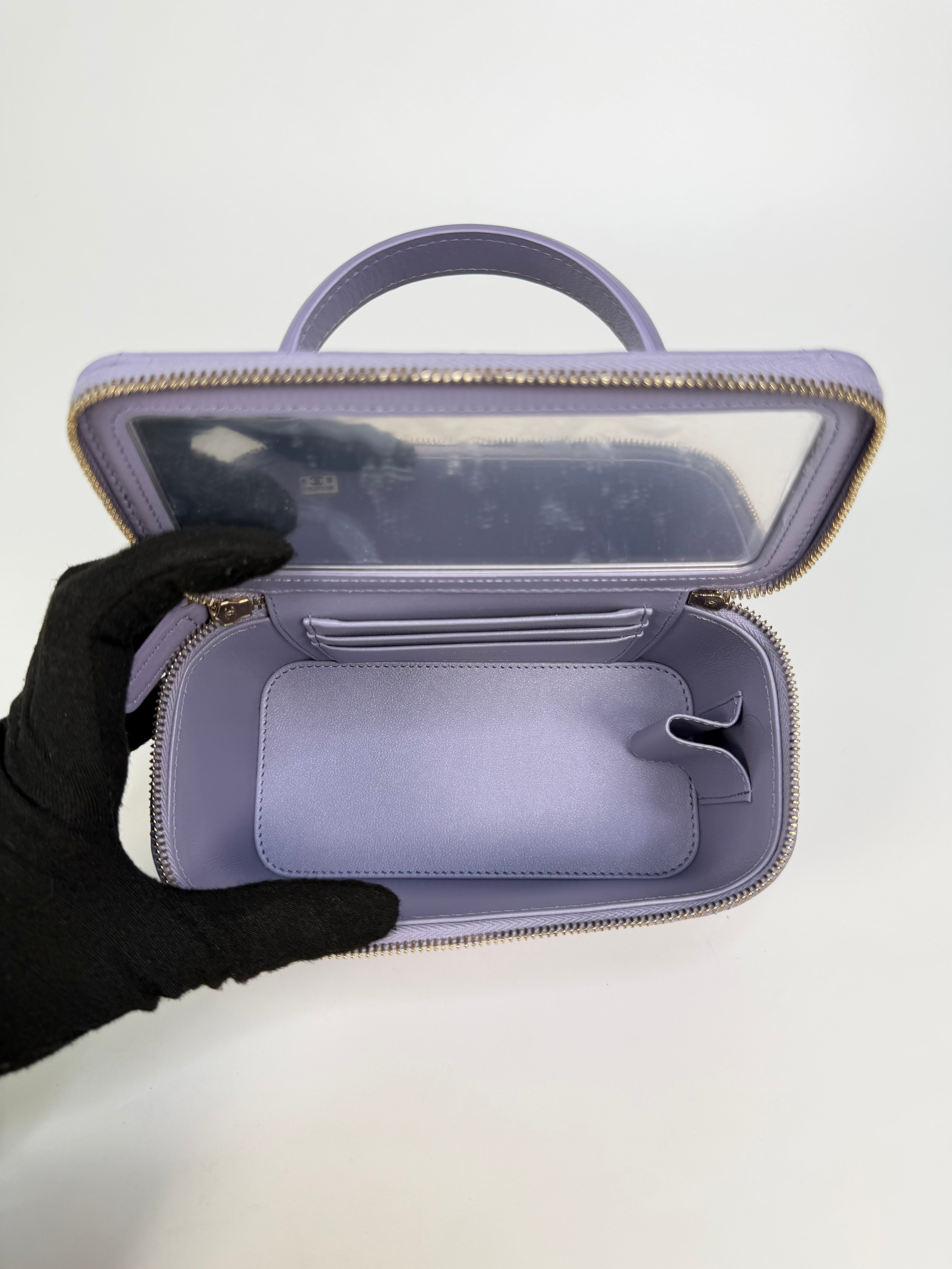 Chanel Mini Vanity Top Handle In Lilac Lambskin Leather With Gold Hardware. Authentic and preloved in excellent condition